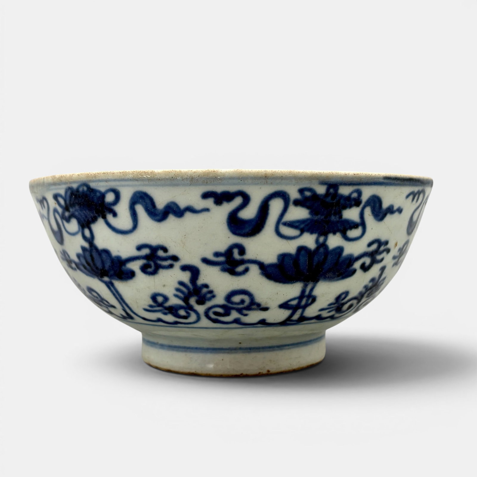Ming Blue and White Bowl: Late Ming or Transitional, a "cloud" kiln or shop mark to underside within double ring. Ht. 2.75", diameter 6".