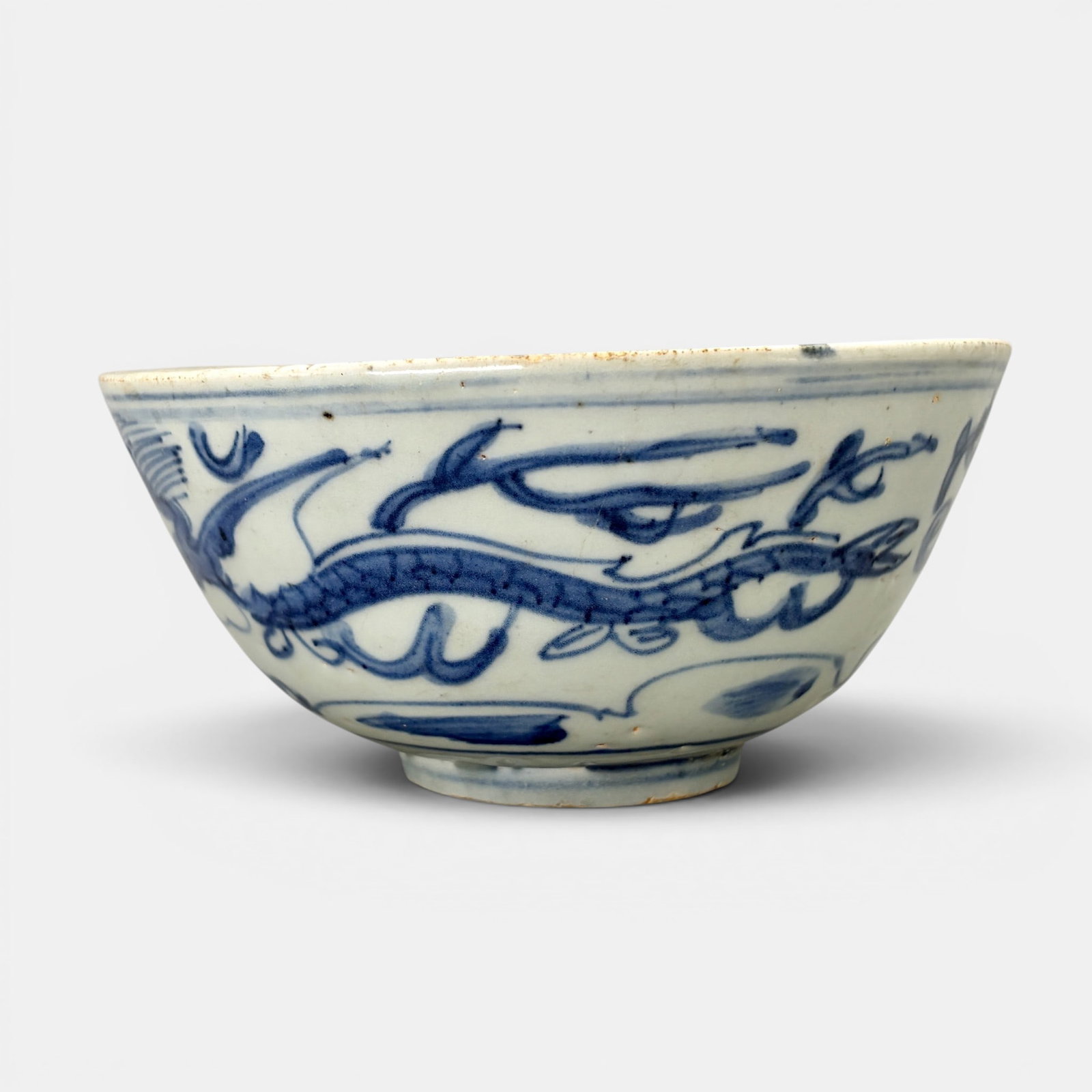 Ming Blue and White Dragon Bowl: Blue and white, with dragon to exterior body, interior with underglaze blue decoration. Ht. 2.75", diameter 6".