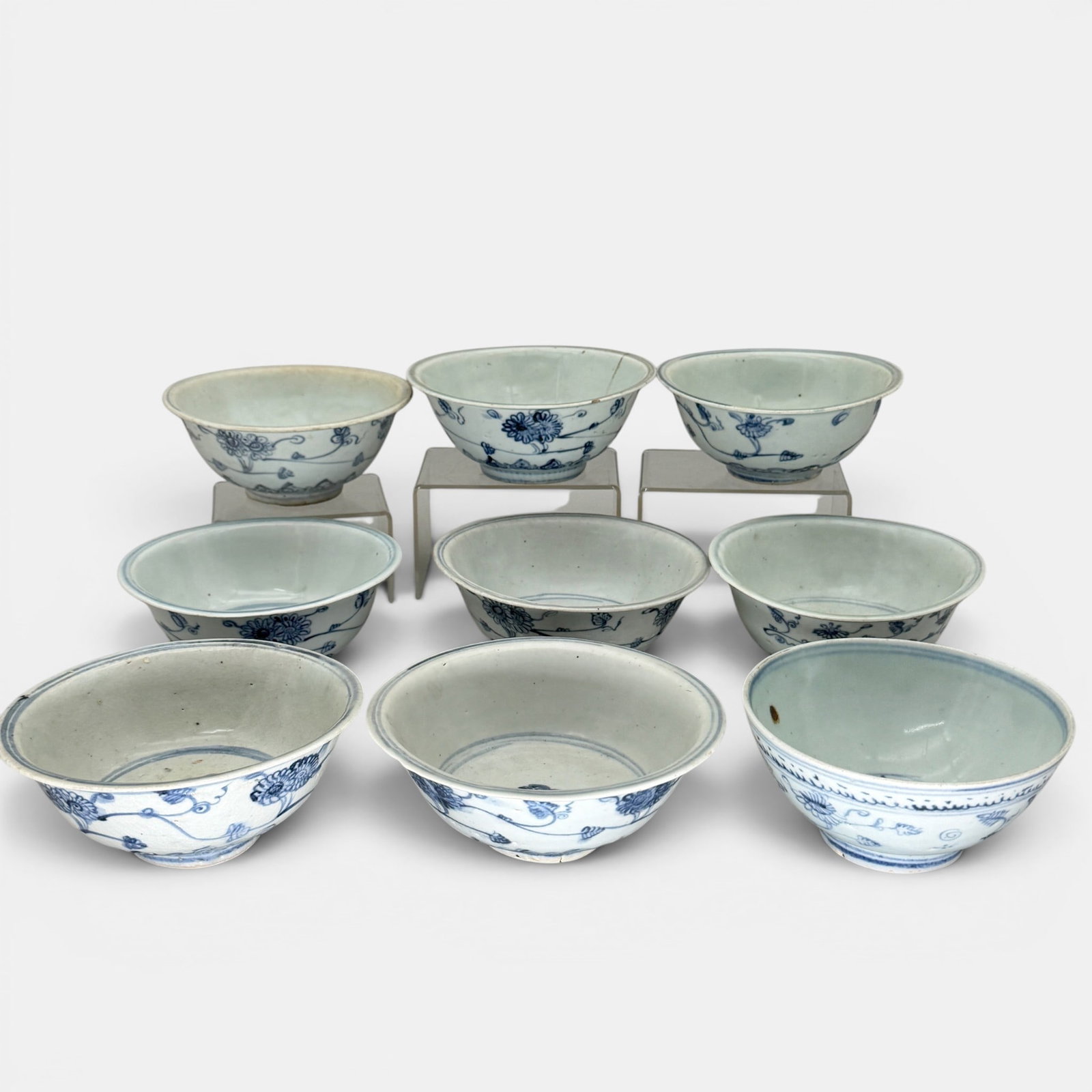 Collection of 9 Ming Blue and White Bowls: Each Ming period, with similar design of floral and branch. Largest ht. 3", diameter 6.5".