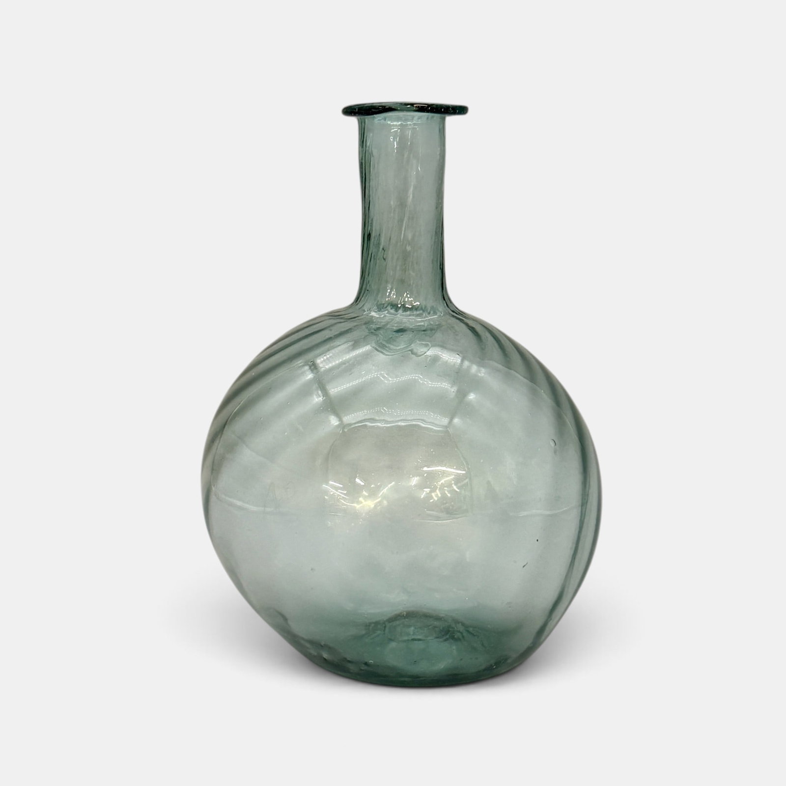 Early Blue Glass Swirl Bottle: With flaired rim and swirled ribs. Height: 8"