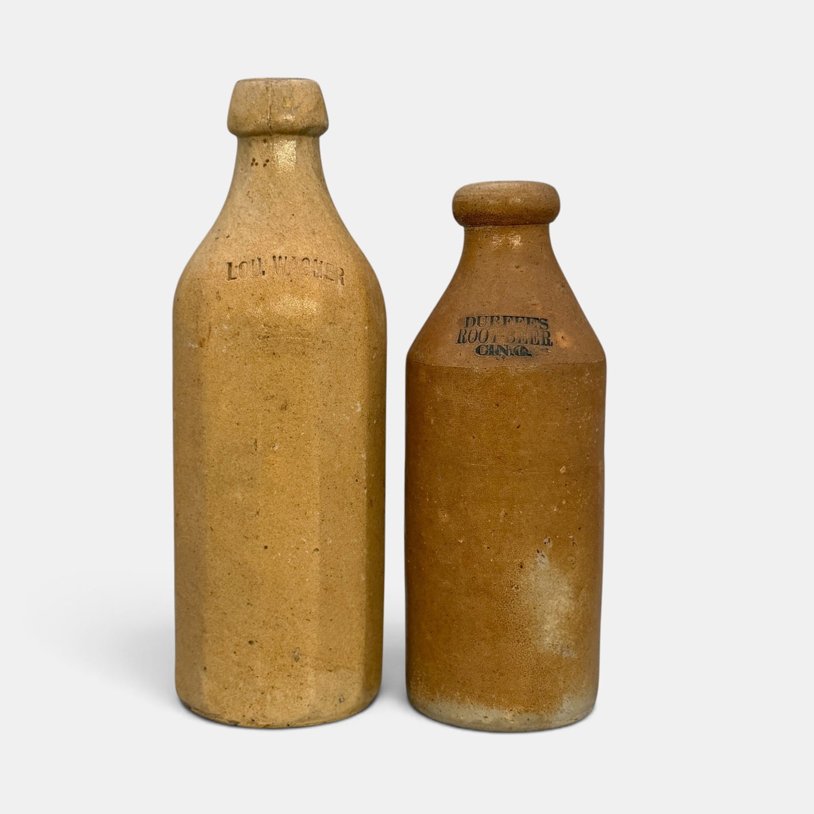 Two early ceramic bottles, Durfee's Root Beer and Lou. Wagner. (1 of 6)