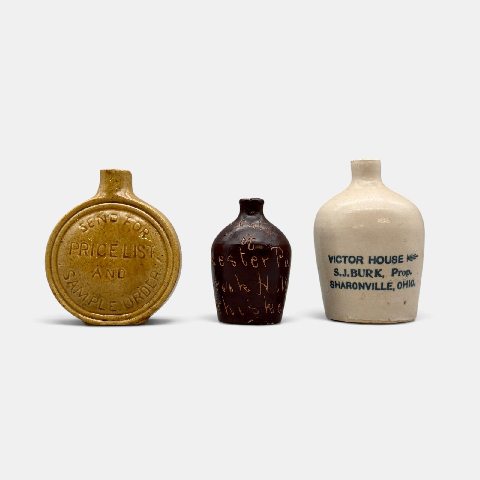 Three small whiskey jugs, S.J. Burk, Sharonville, Ohio, Maplewood Distillers, Cincinnati, Ohio and (1 of 5)