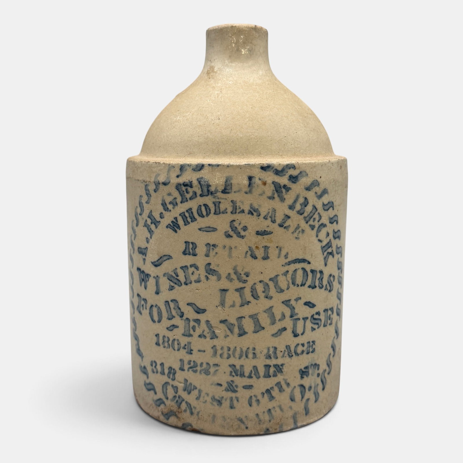 Small stoneware whiskey jug, A.H. Gellenbeck, Cincinnati, O.: Small whiskey jug with cobalt lettering for "A.H. Gellenbeck Wholesale & Retail Wines & Liquors for Family Use, 1804 -1806 Race, 1227 Main & 318 West 6th St. Cincinnait, O'. Height 7 1/8 inches. From