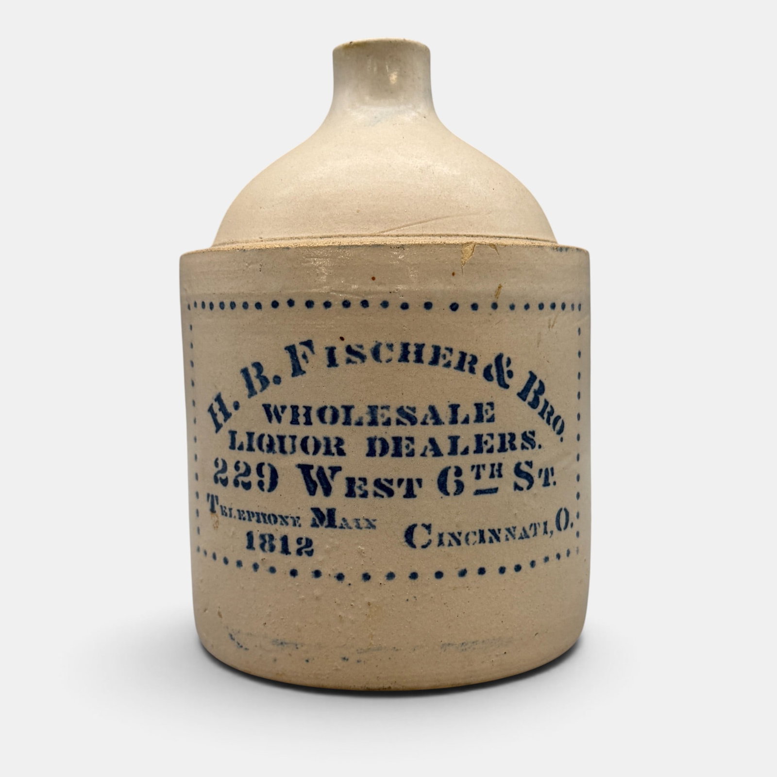 Whiskey jug with cobalt lettering for "H.B. Fischer and Bros. Cincinnati, O.": Whiskey jug with cobalt lettering for "H.B. Fischer & Bros. Wholesale Liquor Dealeers. 229 West 6th St. Telephone 1812, Cincinnati, O." Height 8 1/2 inches. From the Jerry Stehlin Collection.