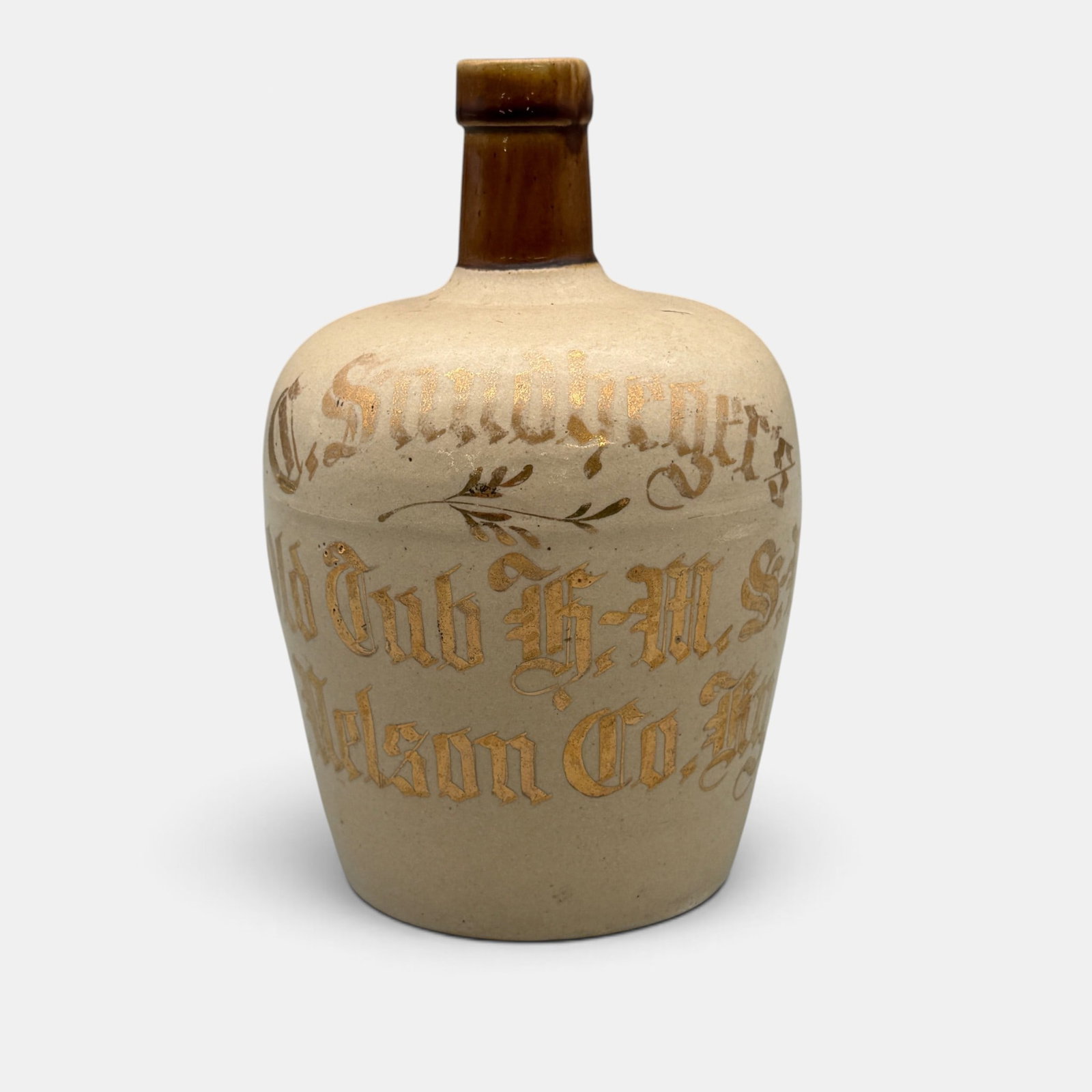 Two color whiskey jug, C. Sundhegers, Nelson County, Kentucky.: Two color jug with gold lettering, "C Sundhegers, Old Cub H.M.S.M. Nelson Co. Ky. Height 7 3/8 inches. From the Jerry Stehlin Collection.