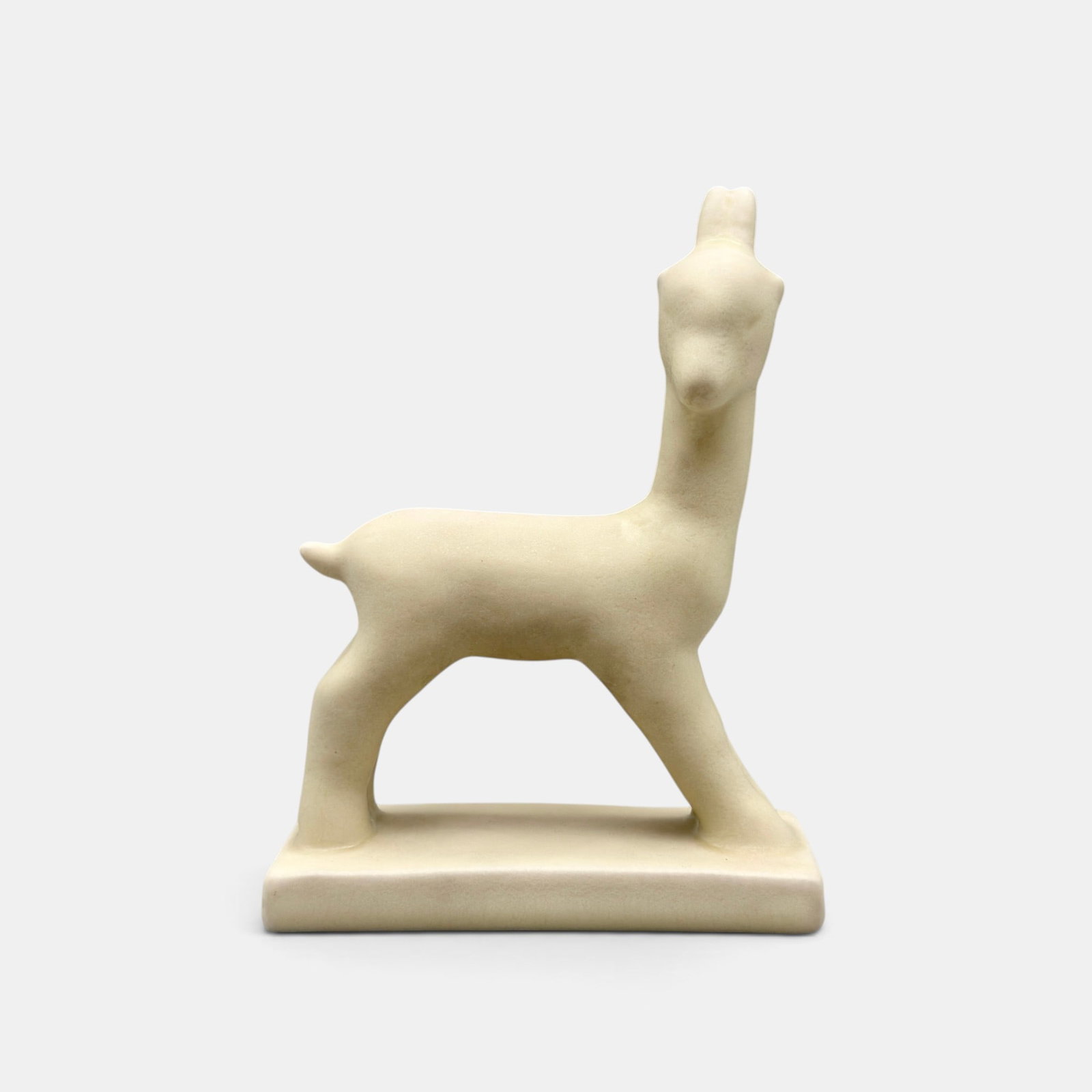 Rookwood Goat paperweight, 1945: Rookwood Goat paperweight, a Louise Abel design, done in white mat glaze in 1945. Impressed Rookwood logo, XLV, shape number obscurred by glaze but it is 6170. Height 6 1/8 inches.