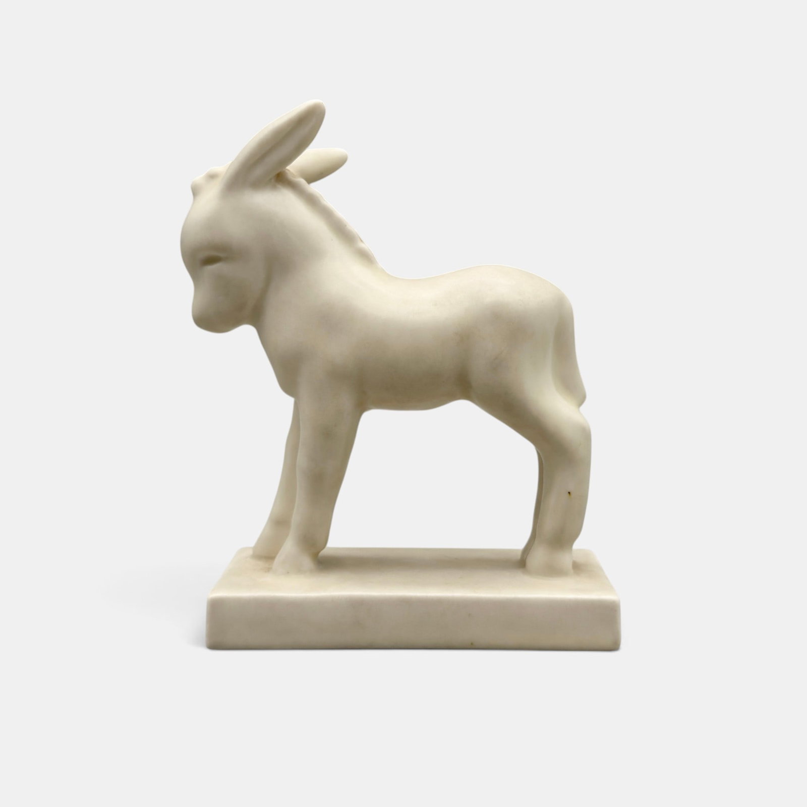 Rookwood Donkey paperweight, 1941: Rookwood Donkey paperweight, a Louise Abel design, done in white at glaze in 1941. Impressed Rookwood logo, XLI, Shape number 6241. Printed 61st Anniversary mark in black. Height 6 1/8 inches.