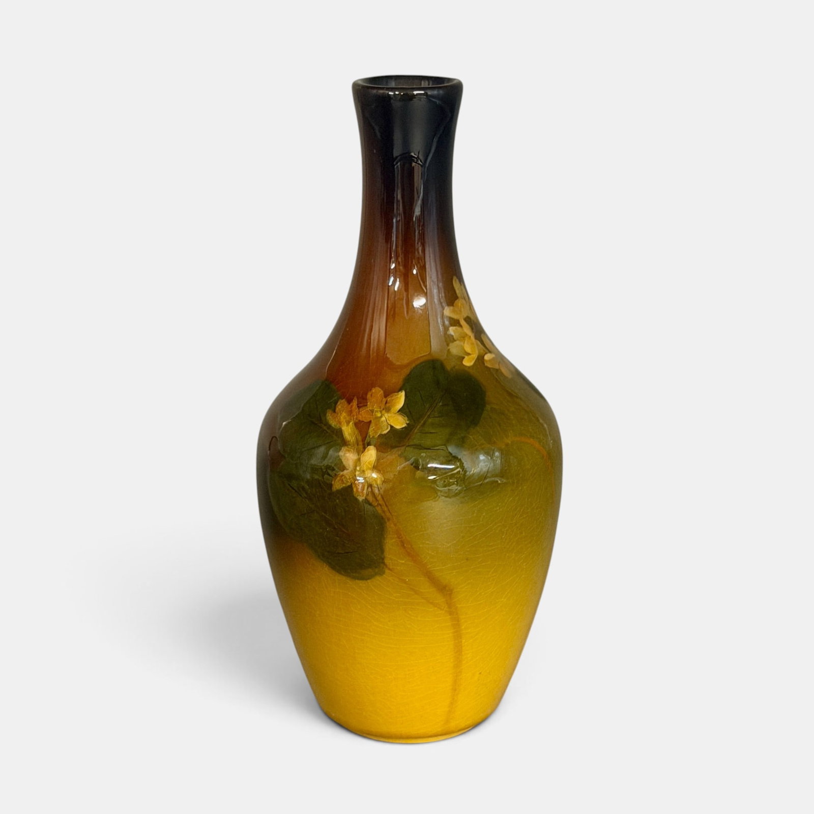 Rookwood Standard glaze vase, floral, Steinle, 1902: Rookwood Standard glaze vase with small yellow flower painted by Carrie Steinle in 1902. Impressed Rookwood logo, II, Shape number 744 C. Incised CS monogram. Height 7 1/2 inches.
