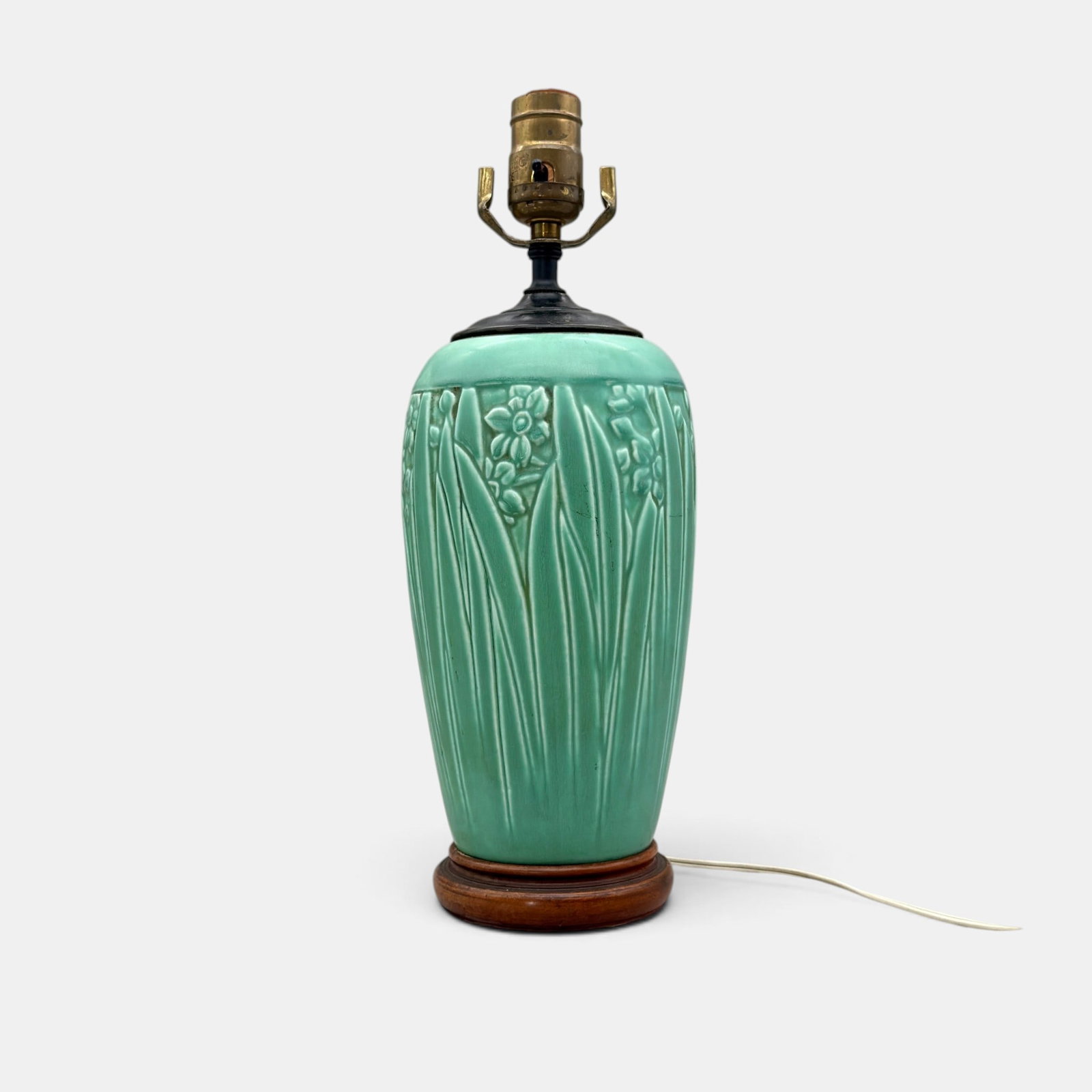 Rookwood production vase, converted to a lamp, circa 1920: Rookwood narcissus production vase, a Shirayamadani design in green mat glaze, converted to a lamp. Impressed shape number 1712. Height of ceramic portion only, 9n1/4 inches.