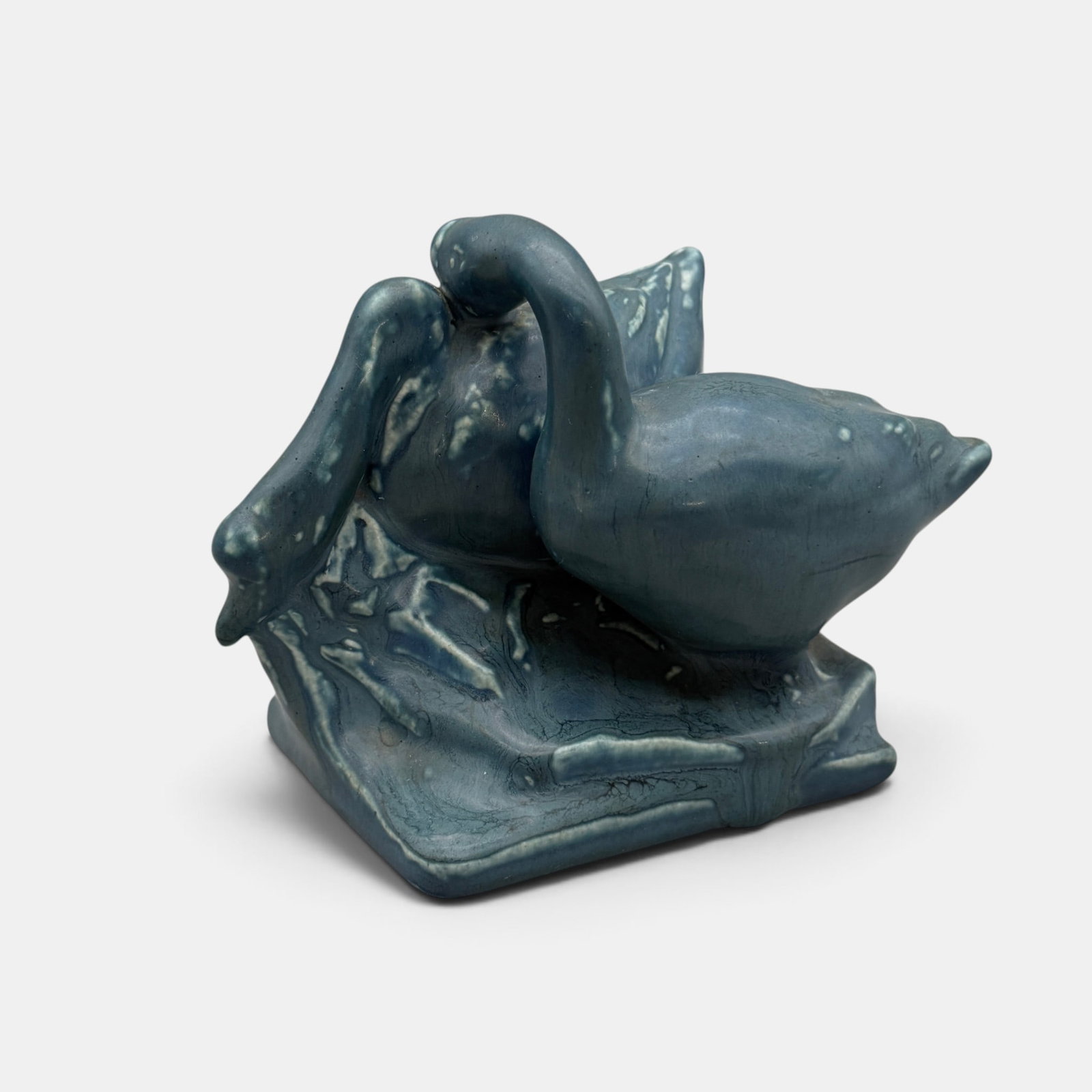 Rookwood Double Goose paperweight, 1922: Rookwood Double Goose paperweight, a Sallie Toohey design, done in a nice, variegated blue mat glaze in 1922. Impressed Rookwood logo, XXII, Shape number 1855. Height 3 7/8 inches.
