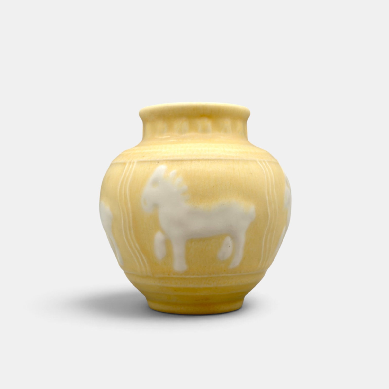 Rookwood two color production vase, horses, 1936: Rookwood two color mat glaze production vase, a Wilhelmine Rehm design done in 1936. Impressed Rookwood logo, XXXVI, Shape number 6498/. Height 4 1/2 inches.
