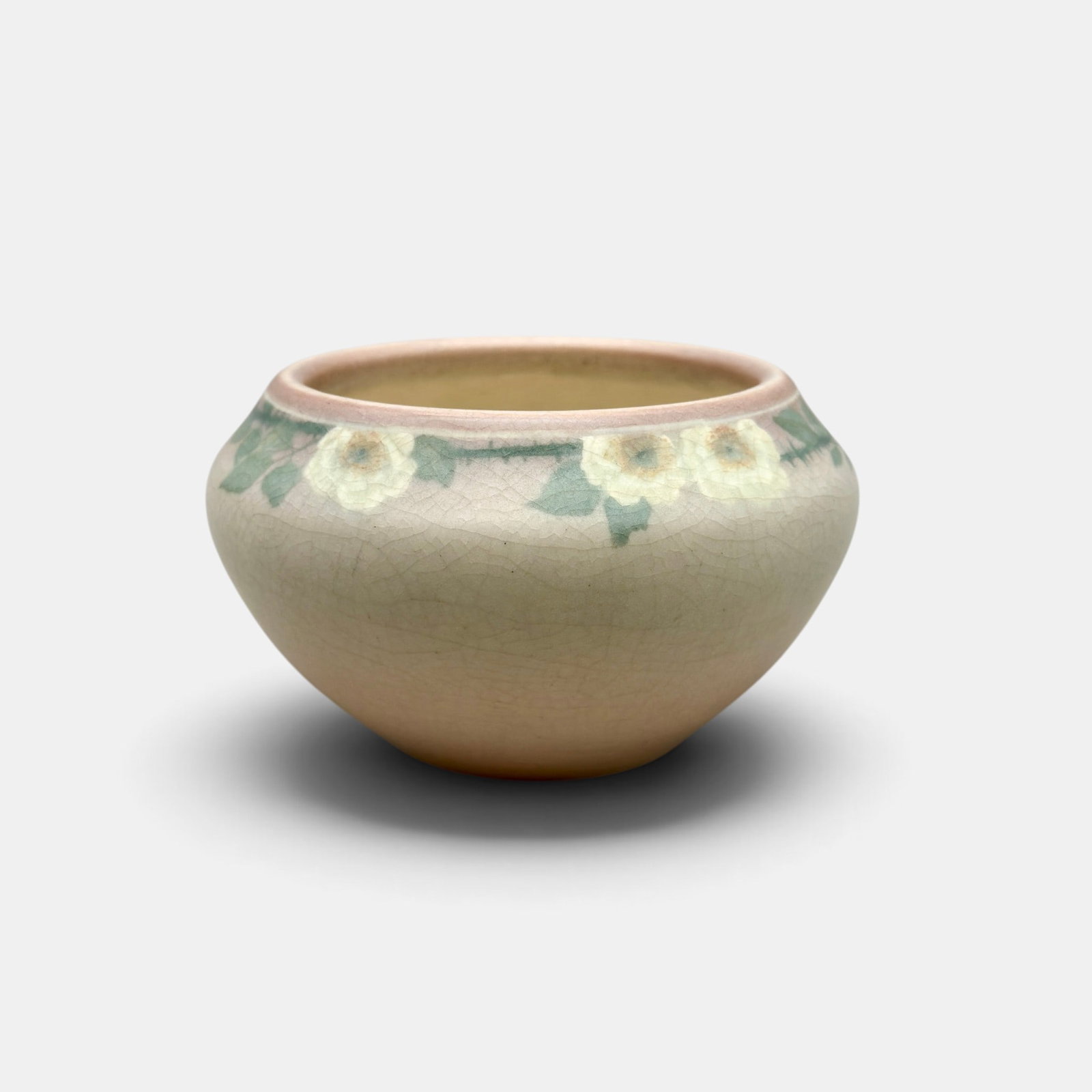Rookwood Vellum bowl, Van Horne, 1913: Rookwood Vellum glaze bowl with vining roses painted by Katherine Van Horne in 1913. Impressed Rookwood logo, XIII, Shape number 955, V. Incised KVH and V. Height 2 3/4 inches, diameter4 5/8 inches.