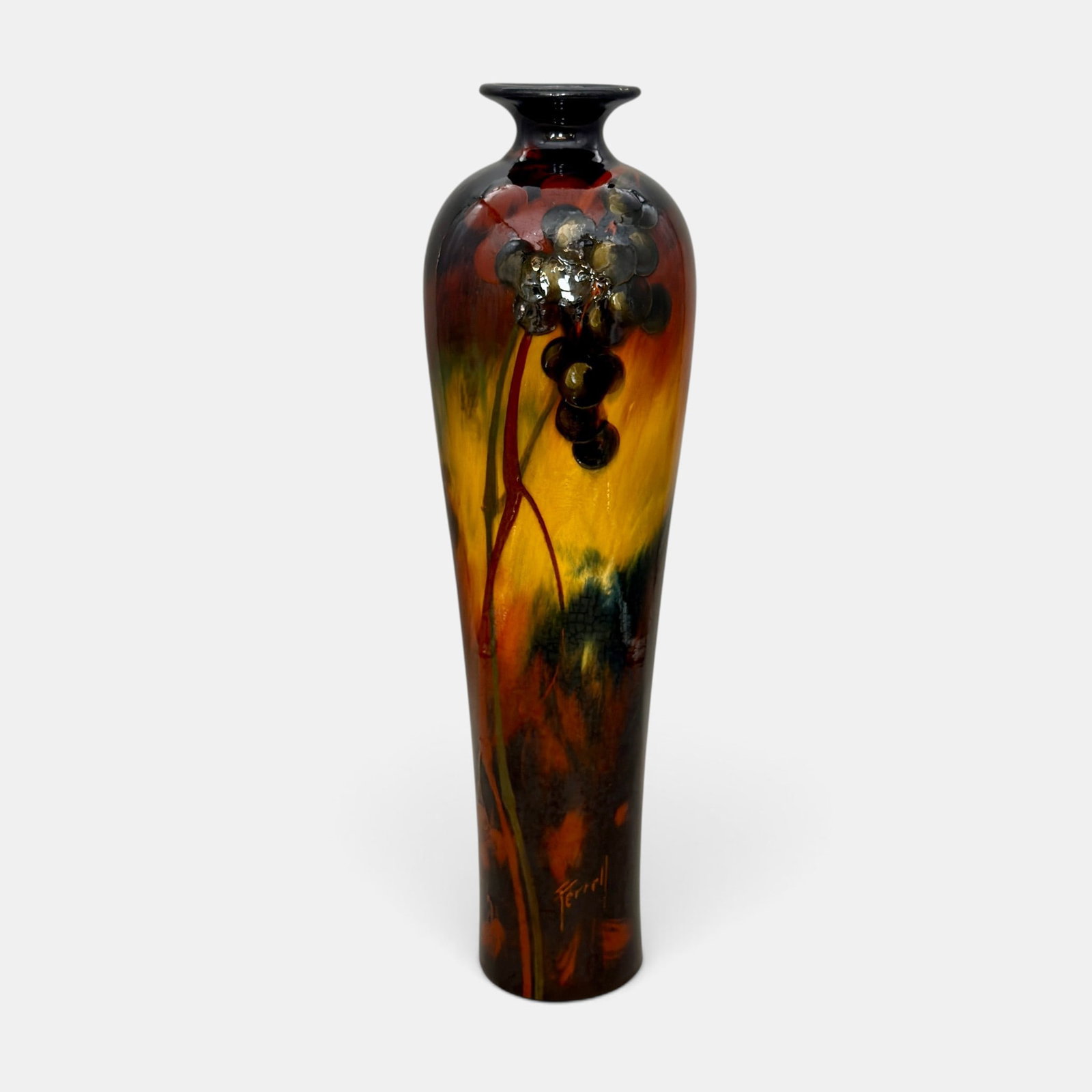 Tall Weller Aurelian vase, grapes, Ferrell: Large Weller Aurelain vase with grape decoration done by Frank Ferrell. Incised Wurelian Weller on bottom. Signed Ferrell in slip on the side. Height 18 1/4 inhes.