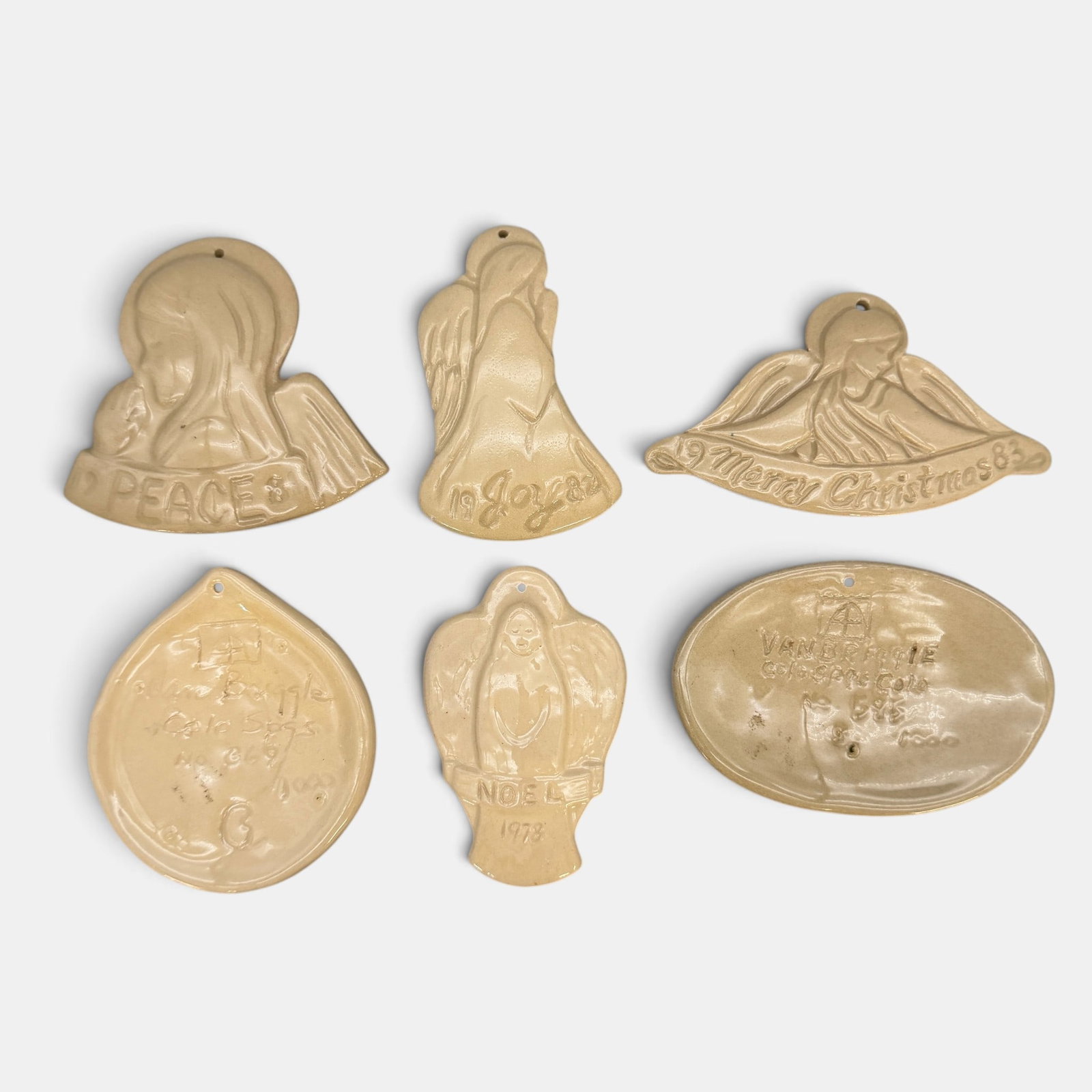 Set of six Van Briggle Christmas ornaments: Assembled Set of six Van Briggle Christmas ornaments from 1978 to 1983. All incised Van Briggle logo with various numbers. Height of the tallest is 4 1/8 inches