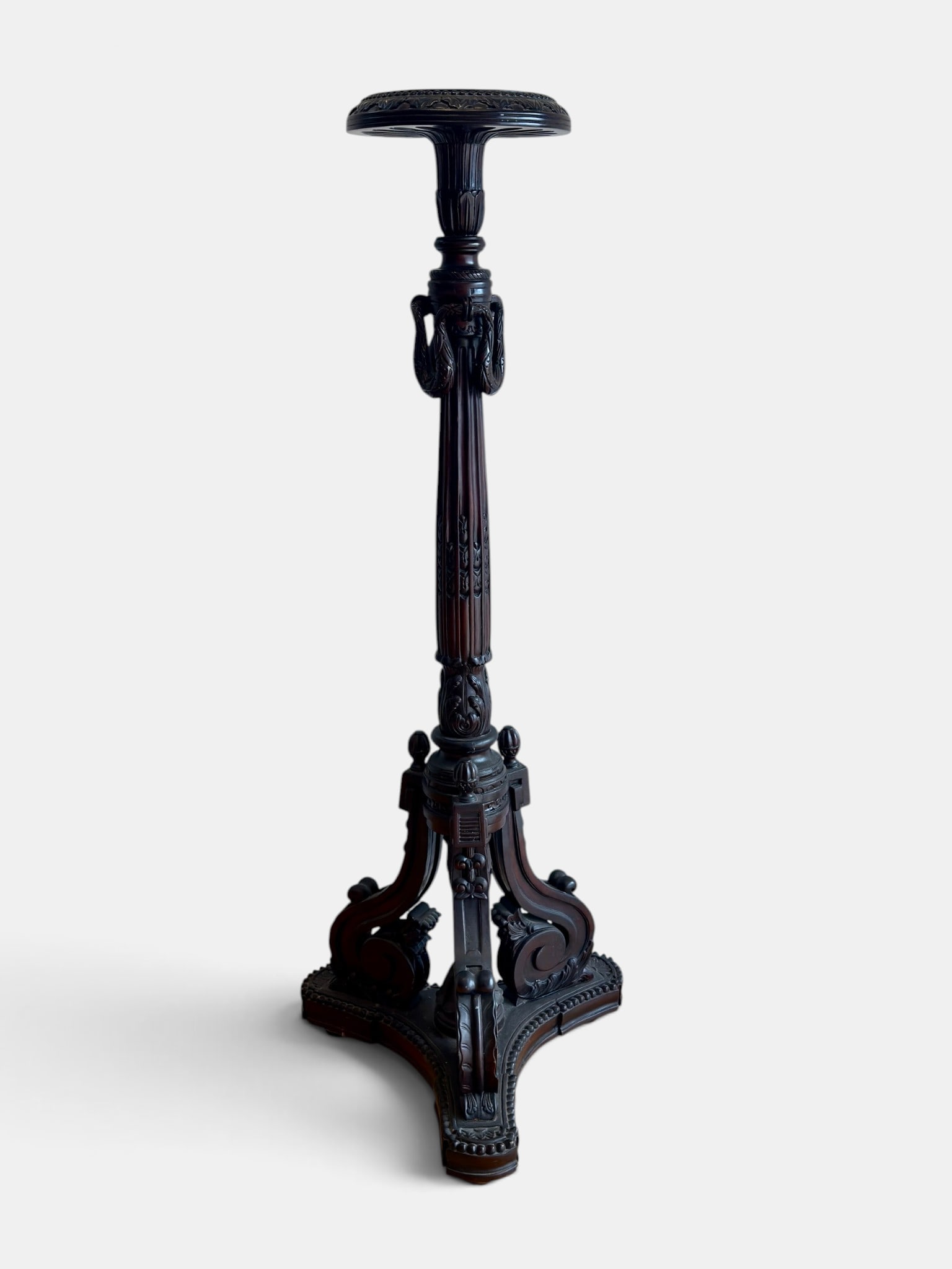 Tall Carved Fern Stand: Early 20th century, a carved plinth stand ending in three ornately carved legs. Ht. 58".