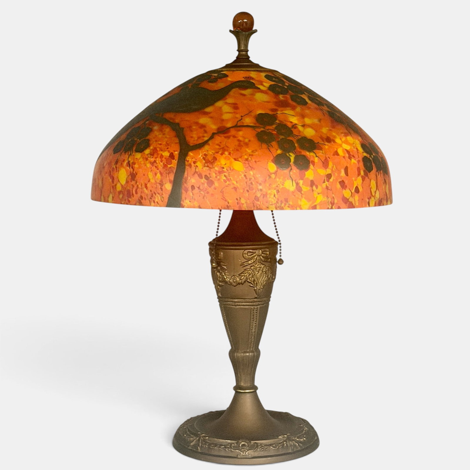 Newer acid etched shade, peacocks, older base: Art glass lamp with what appears to be a newer acid etched shade showing peacocks in flowering boughs mounted to an older, unidentified base. Neither are marked. Diameter of the shade is 15 1/2