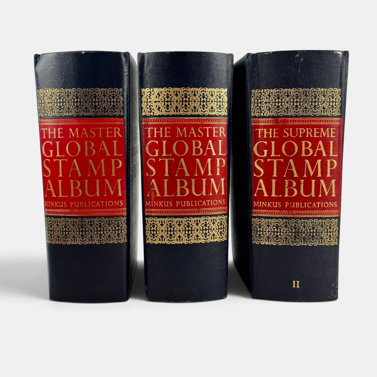 Massive Global Stamp Collection: Including three binders which are partially full- 2 "Master GLobal Stamp Album" binders and one "Supreme", as well as a full box of stamps in enveloes organized by country.