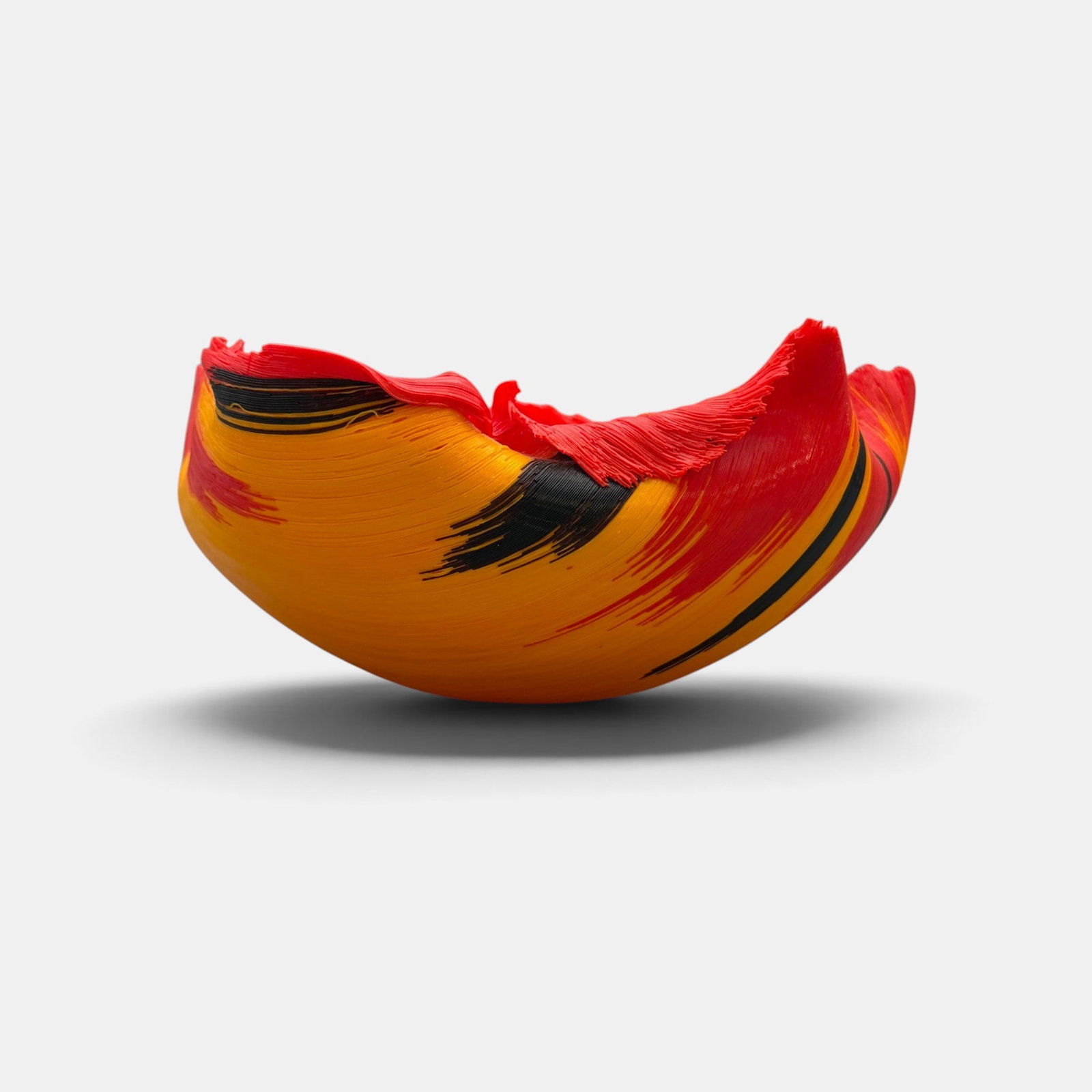 Toots Zynsky: "Birds of Paradise": Toots Zynsky (American, b. 1951). In black, red and orange, a flaring and undulating rim with glass thread. Ht. 4.5", diameter 10".