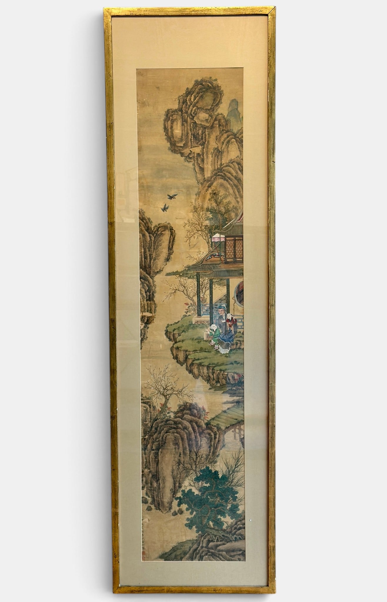 19th Century Japanese Painting on Silk: A large scroll painting on silk, framed, with atmospheric landscape, seals l.l. 78" x 22" (framed).