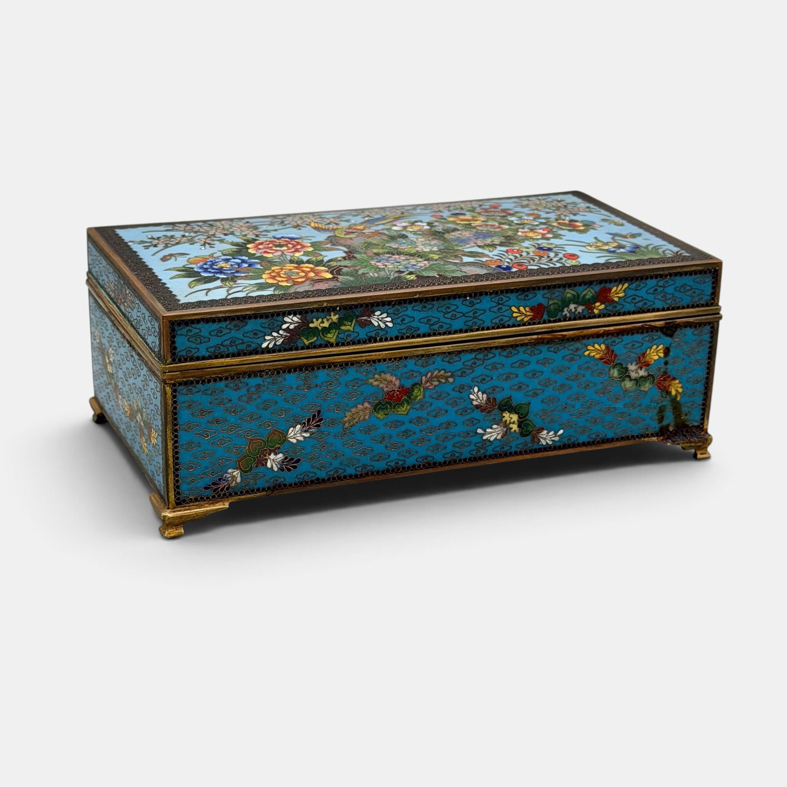 Fine Japanese Cloisonne Box: Meiji Period, with elaborate wire work and fine detail, the interior with incised brass. Lg. 6.25".