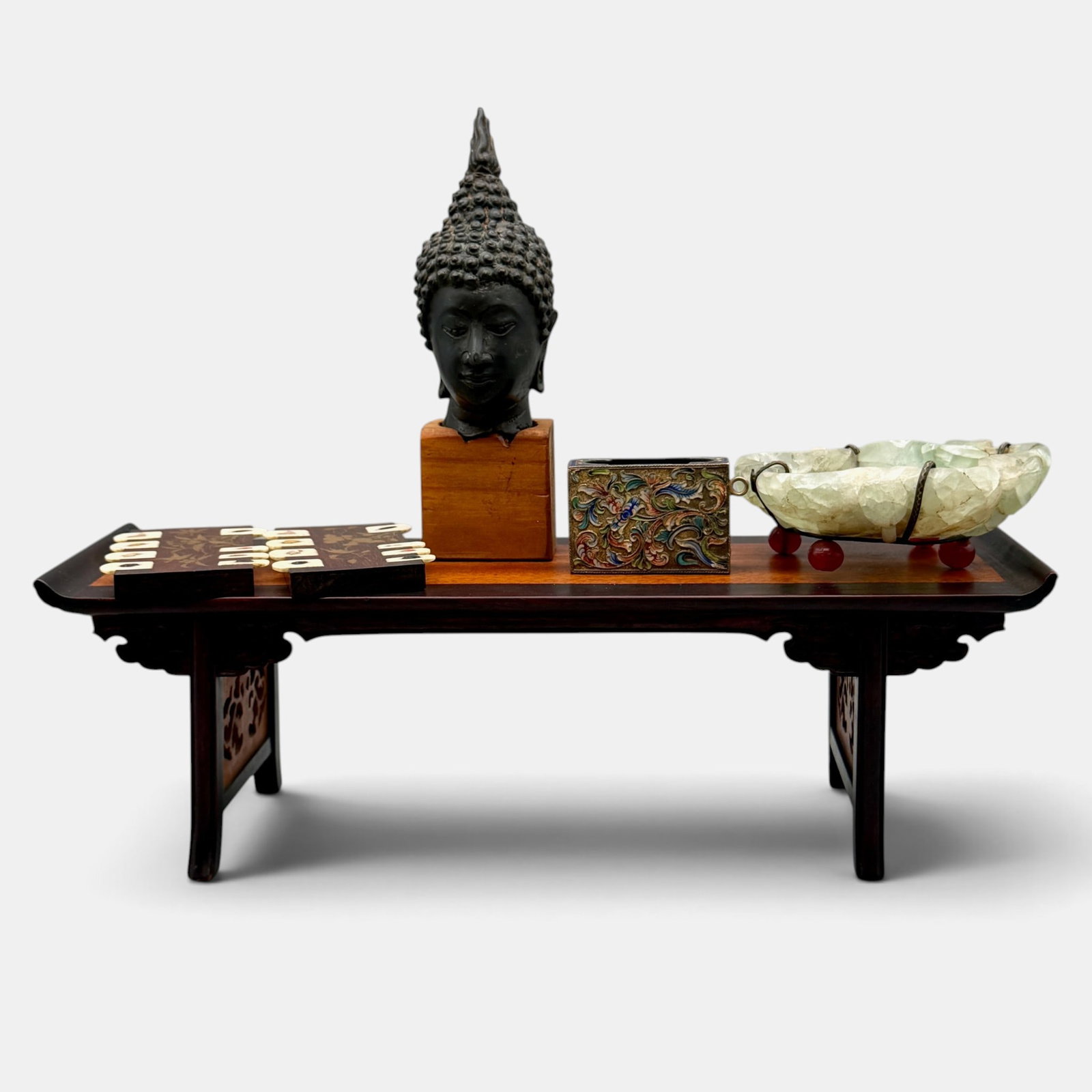 Collection of Chinese/Japanese Items on Altar: Including an 18th century Thai Buddha head, a pair of Japanese lacqwuer and bone counters, a Jadeite tray, and a Chinese enamel match safe. Altar ht. 4"