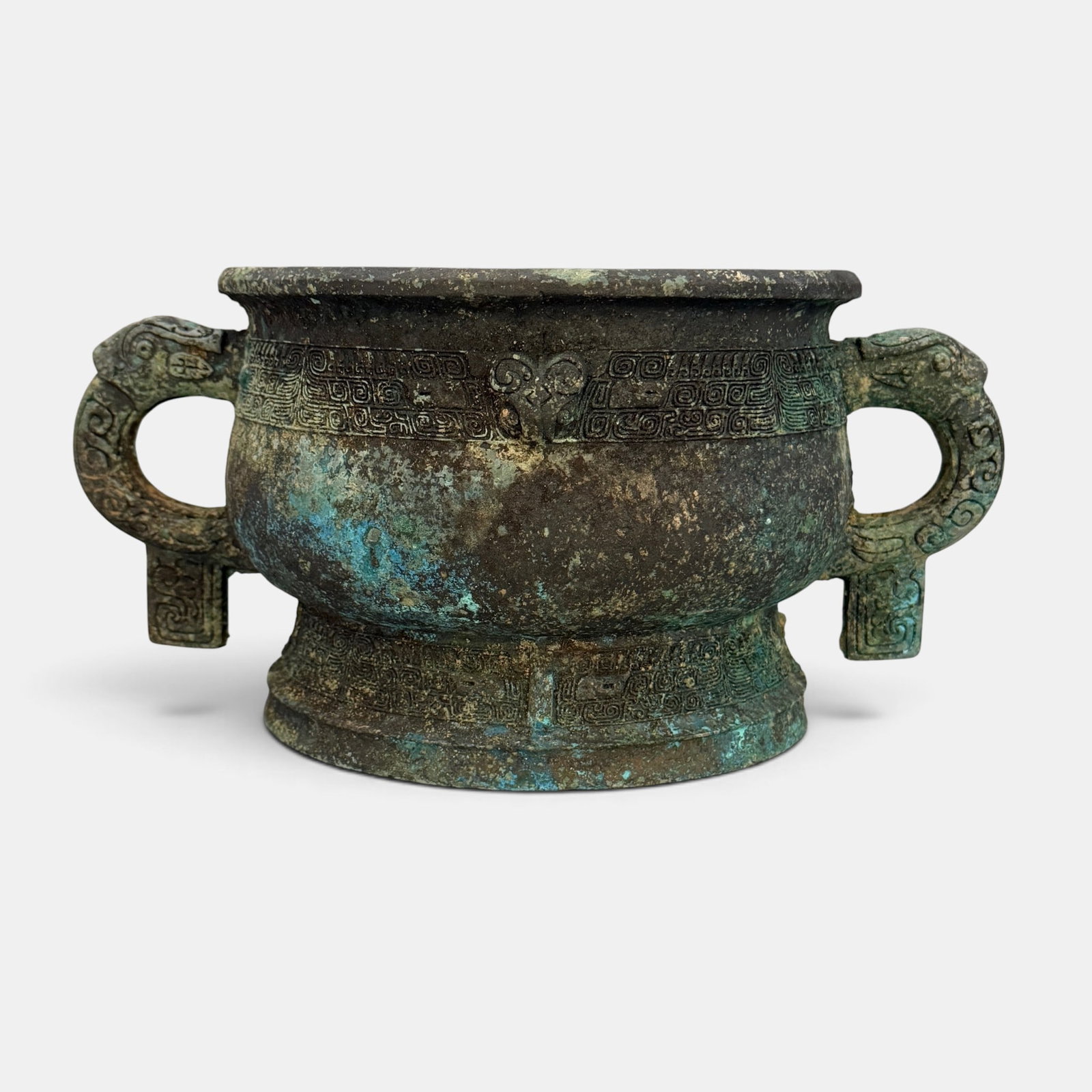 Chinese West Zhour Style Bronze Gui: A two-handled and inscribed West Zhou-style Gui with excellent patina. 5.5" ht., 7.75" diameter.