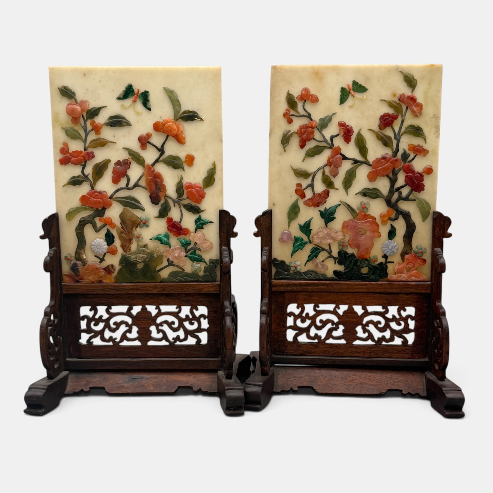 Pair of Chinese Screens on Stand: A pair of Chinese screens, each on carved rosewood stands, with various hardstones. Ht. of each 12.25".