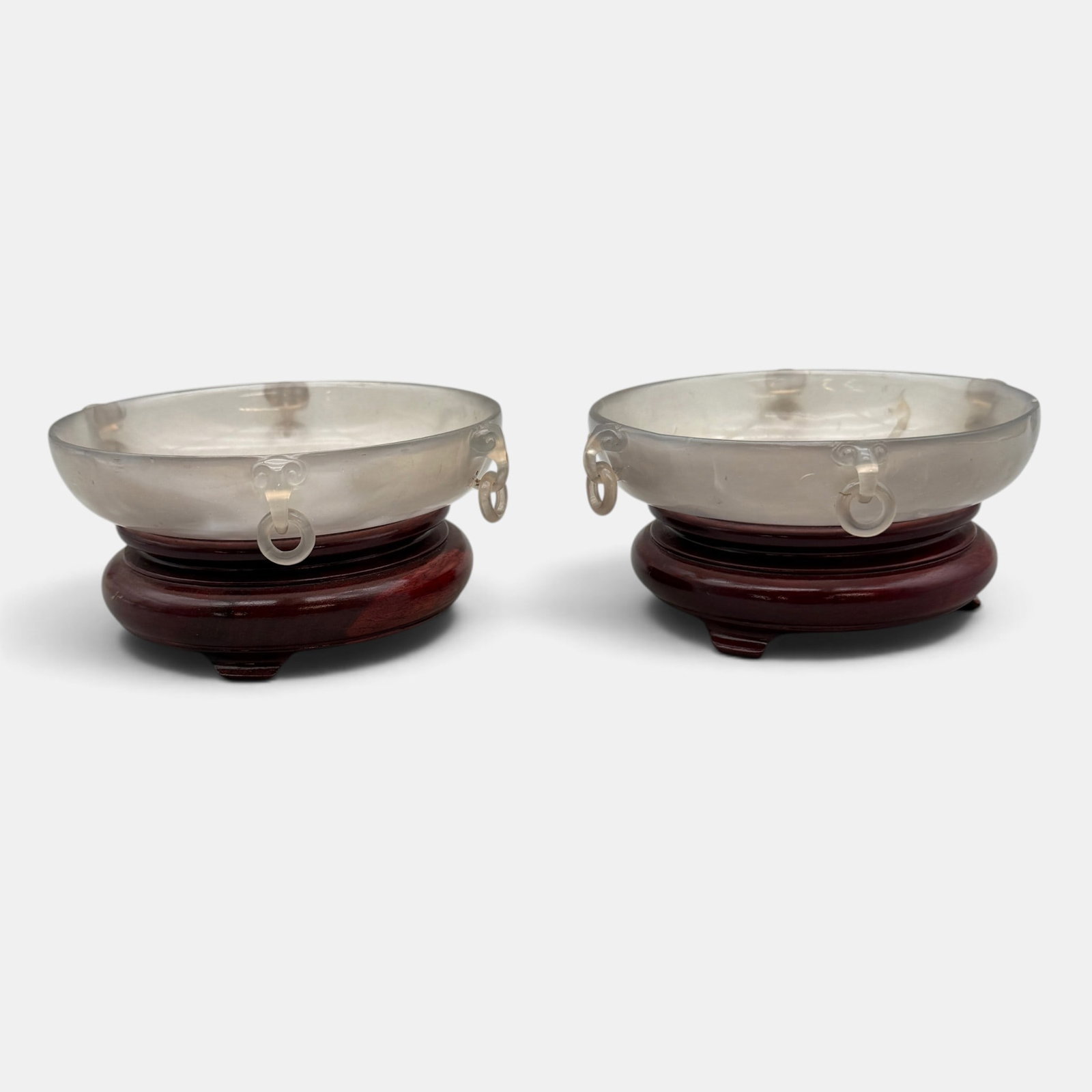 Pair of Chinese Agate Dishes: Early 20th century, Pair of shallow dishes on stands,. Diameter of each: 5"