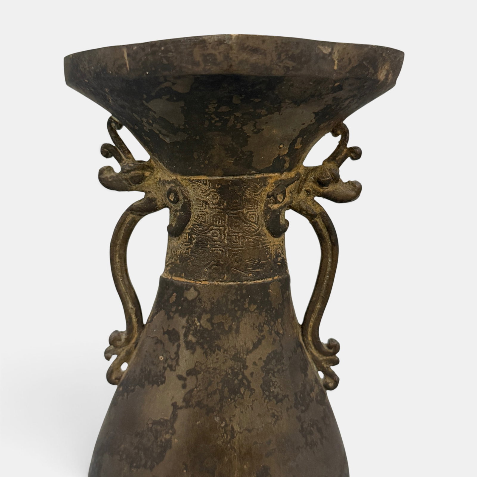 Qing Dynasty Bronze Vase: With two scrolling arms and carved, decorated center. Height: 7.5"