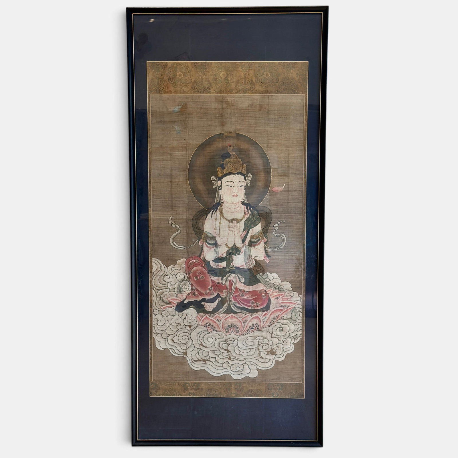 Buddhist Scroll Painting, Framed: 19th century, a watercolor/gouache scroll painting of Buddha seated on lotus and cloud. 67.5" x 30"