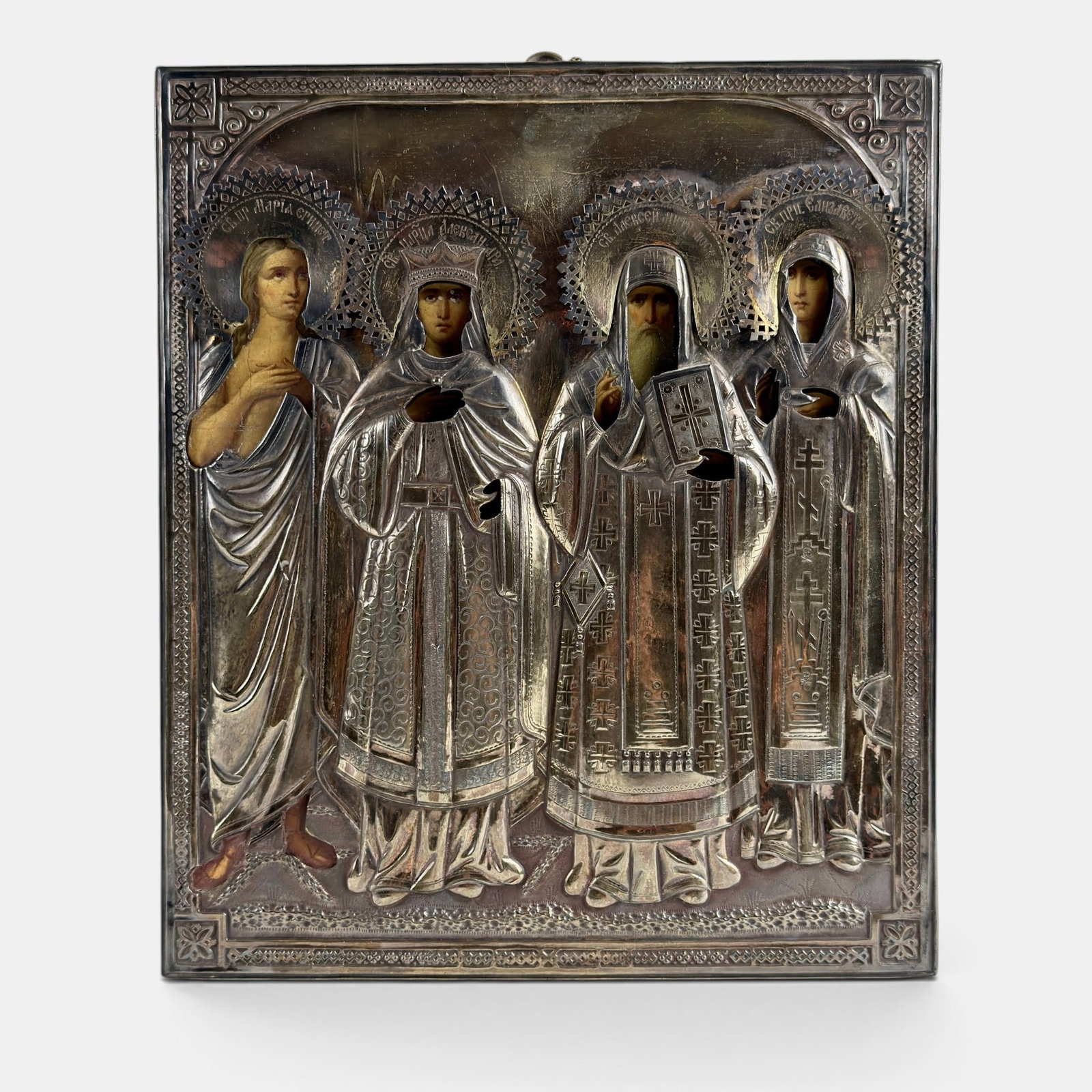 Russian Icon with SIlver Overlay: Late 19th century, a painted icon with silver overwrap, hallmarks and assayer mark to fold. 12.5" x 10.5".