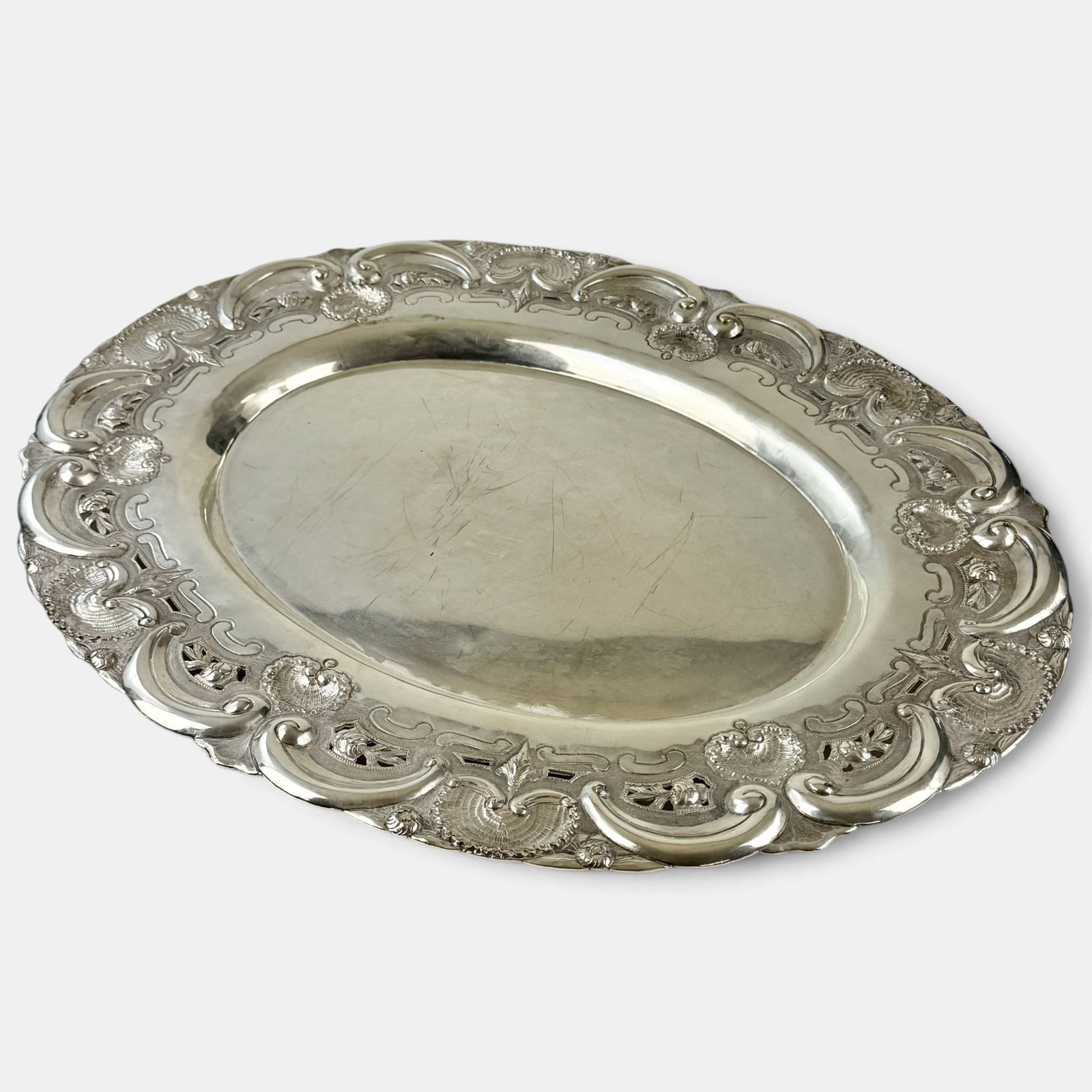 Large Sterling Silver Serving Tray: Early 20th century, patterned design. Total weight: 85 troy ounces
