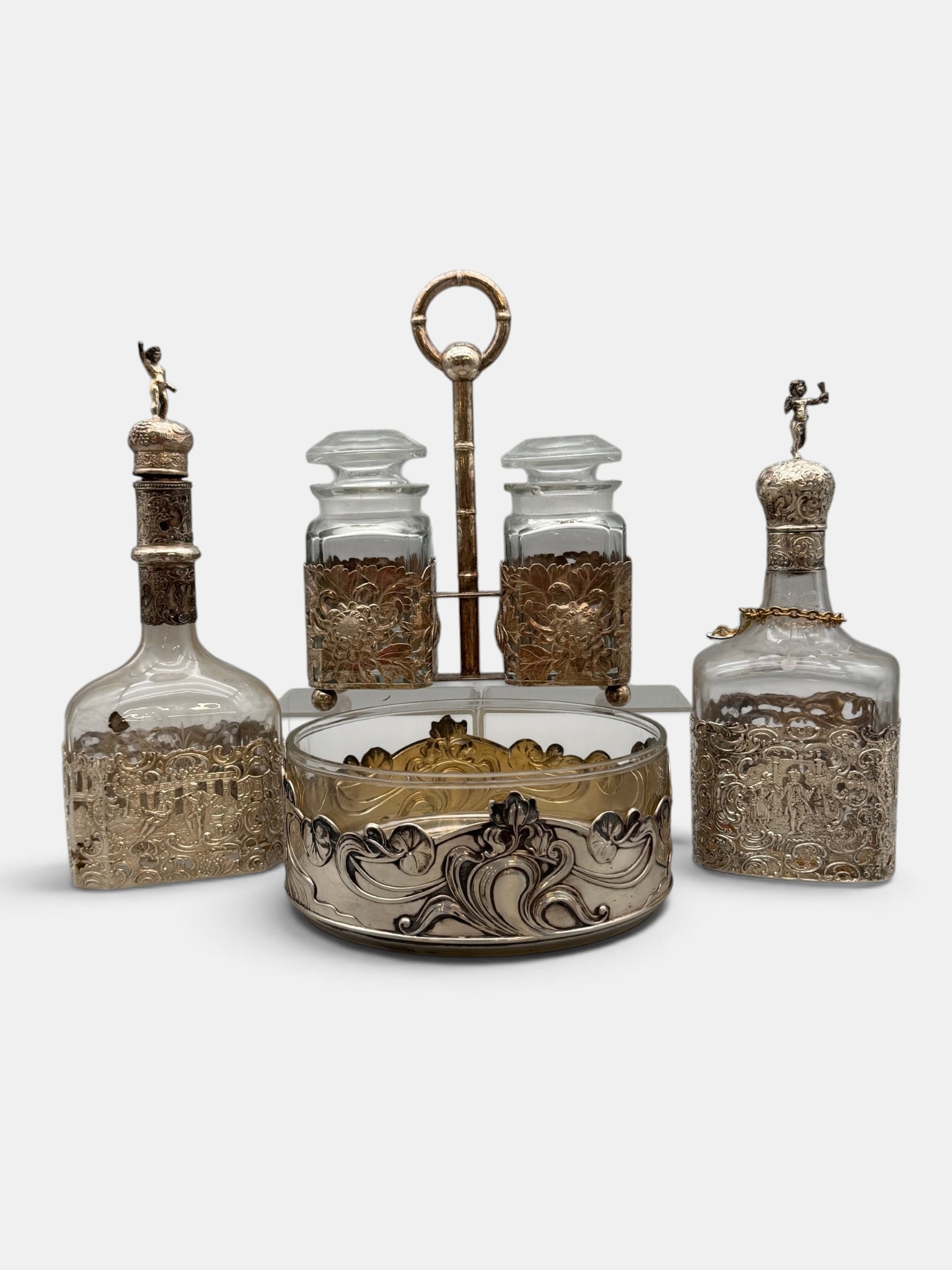 Silver Overlay Decanters and Vessels: Including pair of decanters, glass centerpiece and containers. Tallest height: 10"