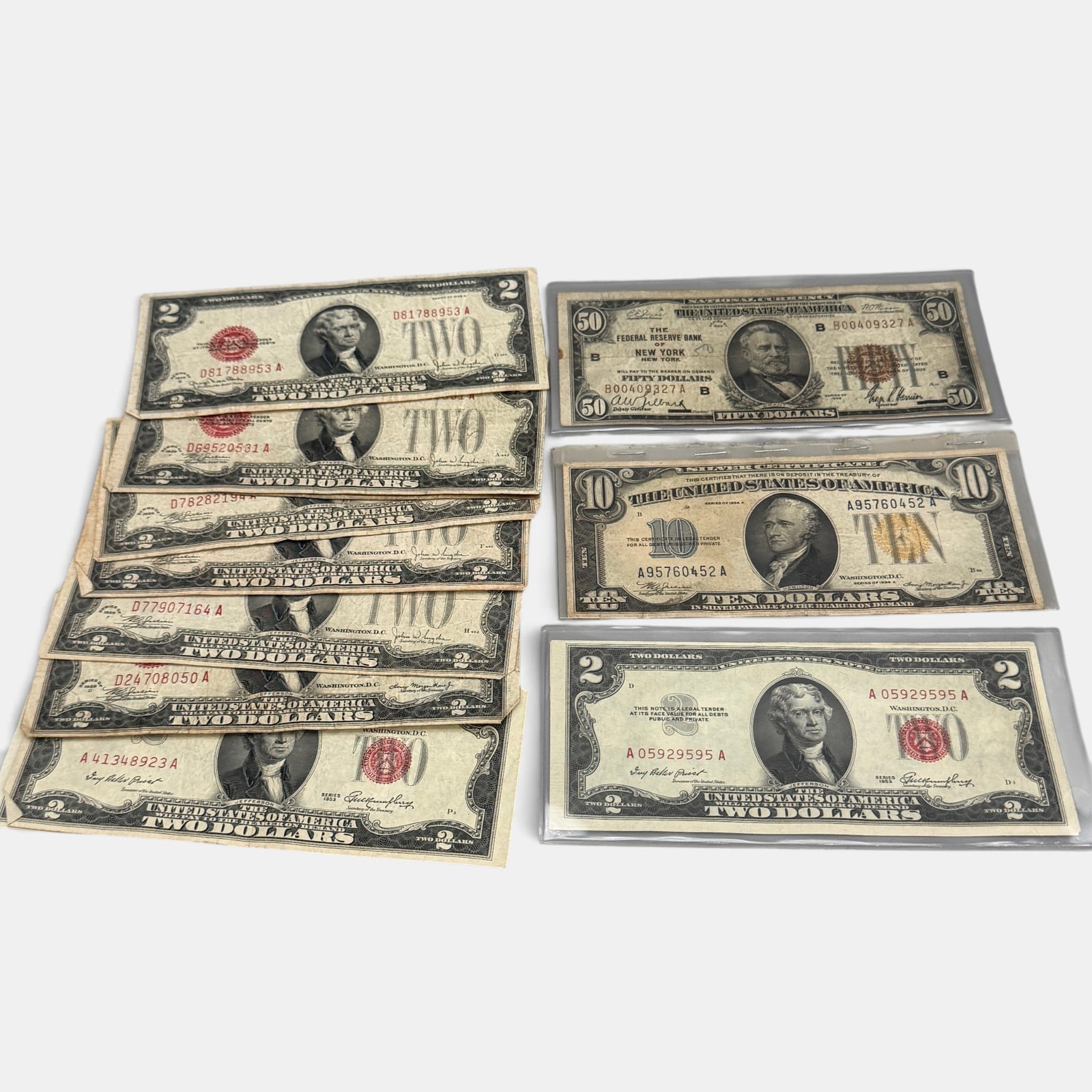Collection of Early American Legal Tender: Including one 1929 $50 bill, one 1934 $10 bill and 8 red seal $2 bills