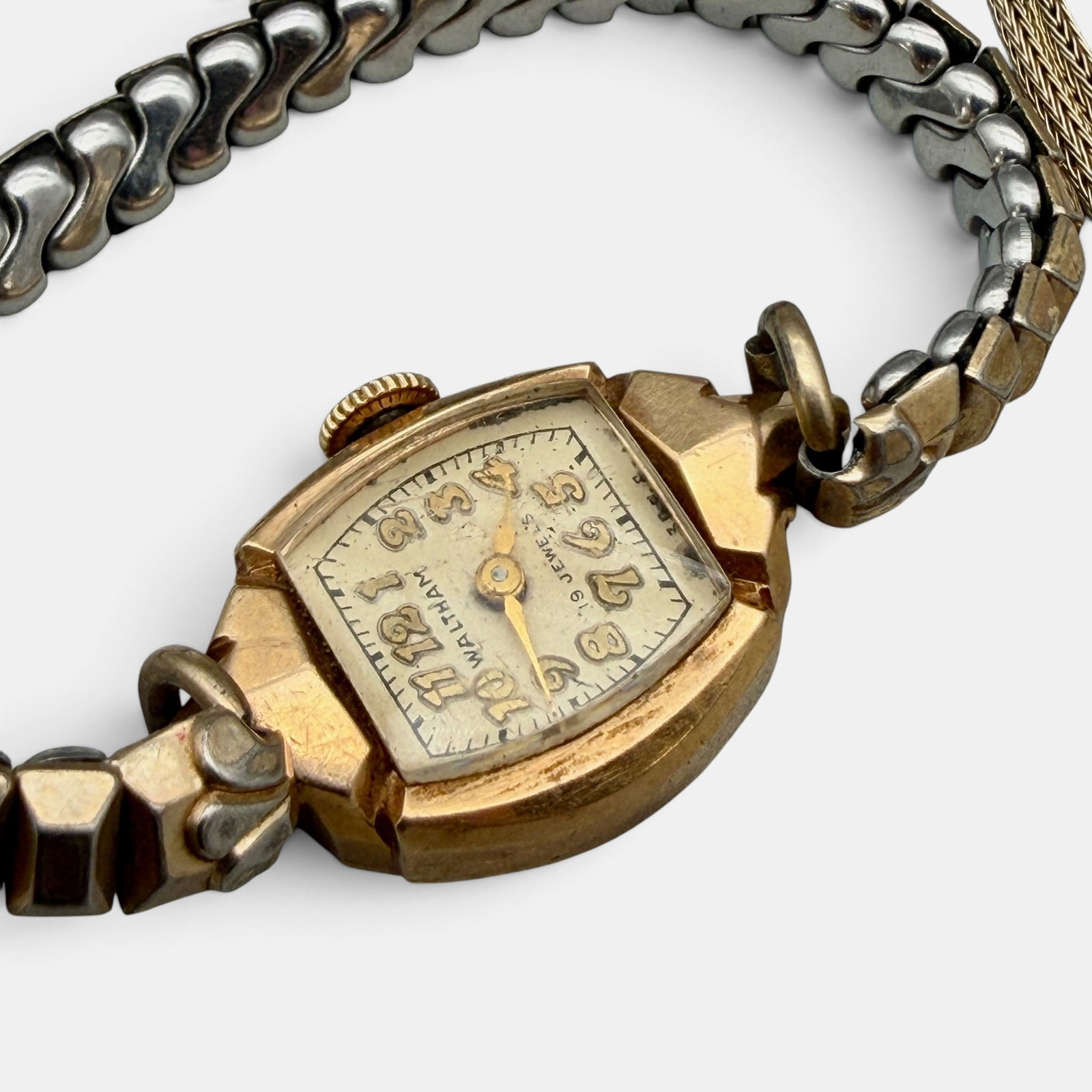 Pair of 14k Gold Cased Watches: Including a Waltham and Elgin ladies' watches, each band gold filled, but cases marked 14k. Total weight .81ozt.