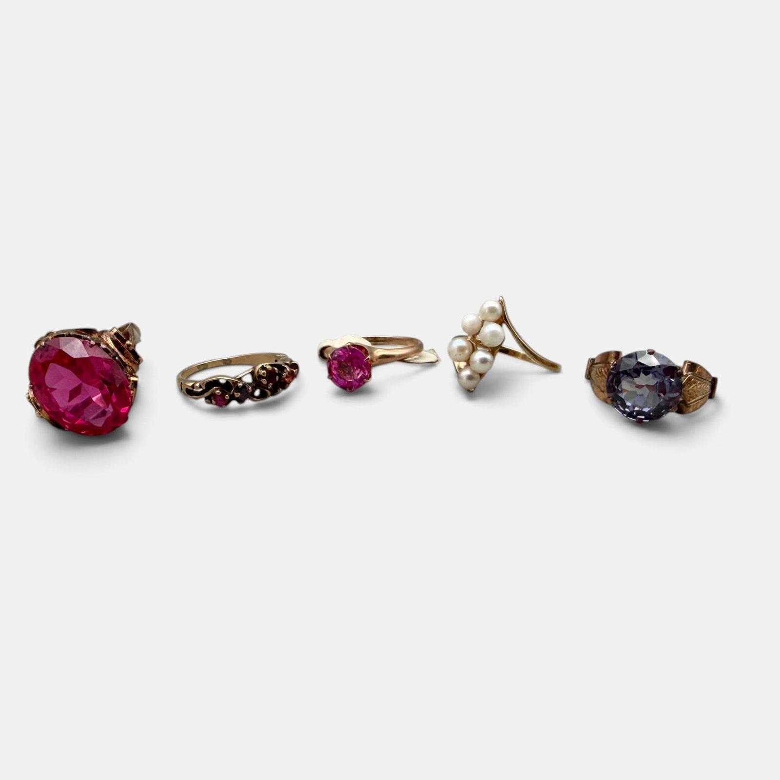 5 Rings in 14k Settings: Various stones, each marked for 14k gold. Total weight .58ozt.
