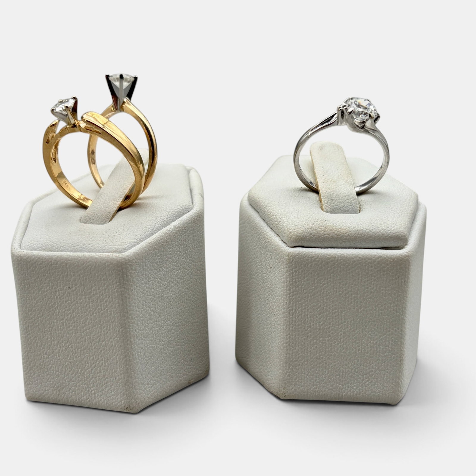 Three 14k and Diamond Rings: Each setting 14k, one with .33 round diamond, one CZ, the other a small example. Total weight .22 ozt.