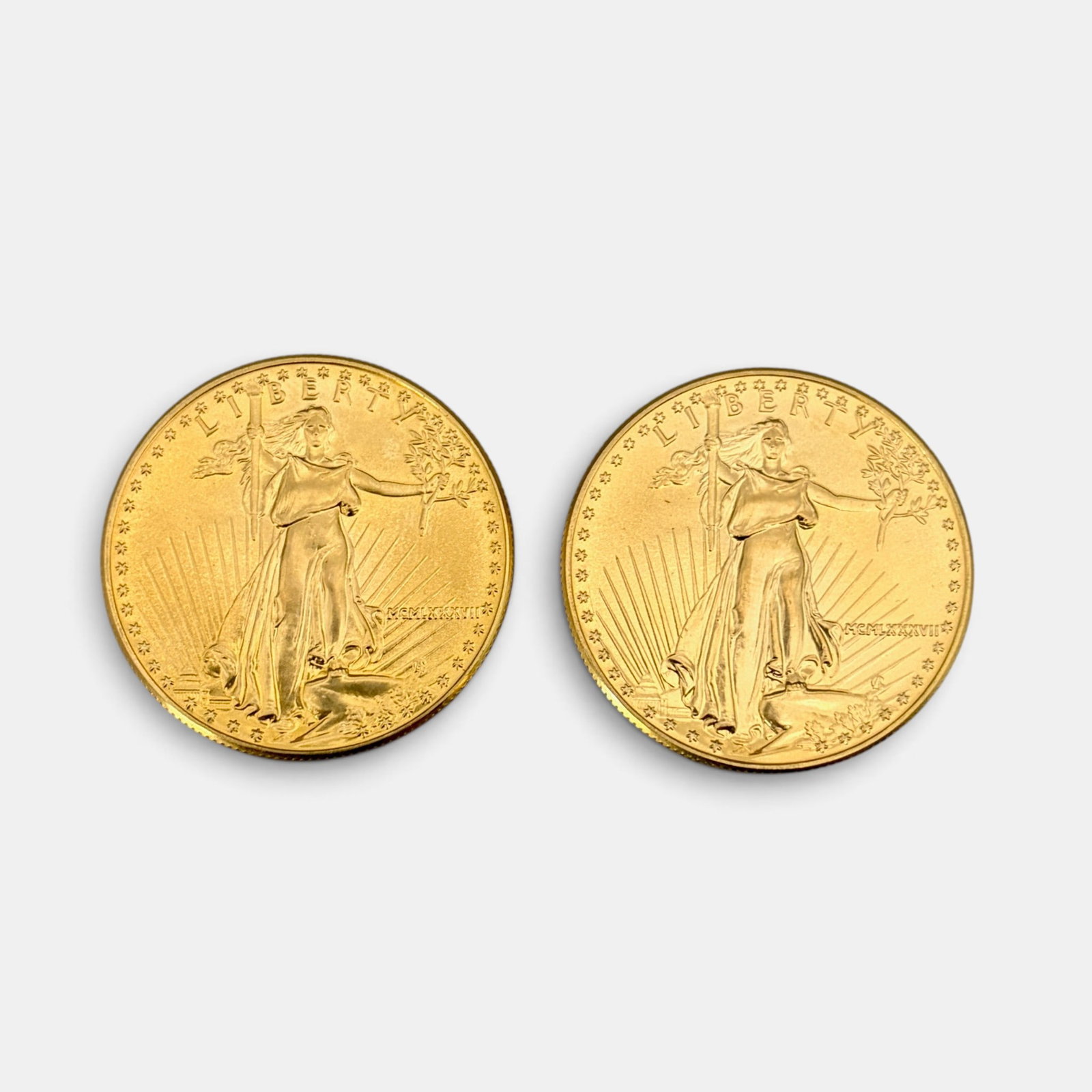 Two One Ounce Fine Gold U.S. Liberty Coins: Two one ounce fine gold liberty coins, both dated 1987.