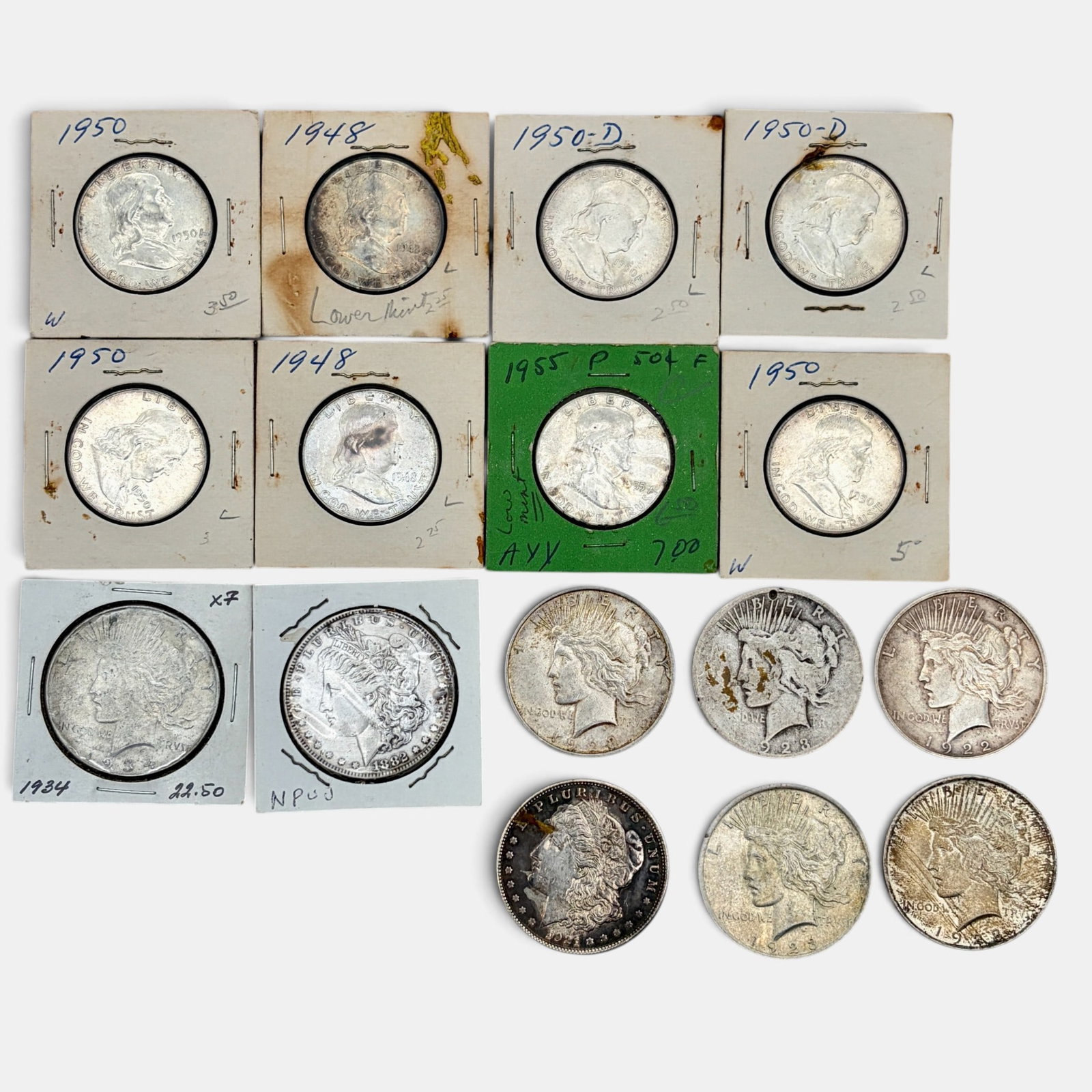 Group of 16 Early American Coins: Including Peace dollars, half dollars and morgan dollars