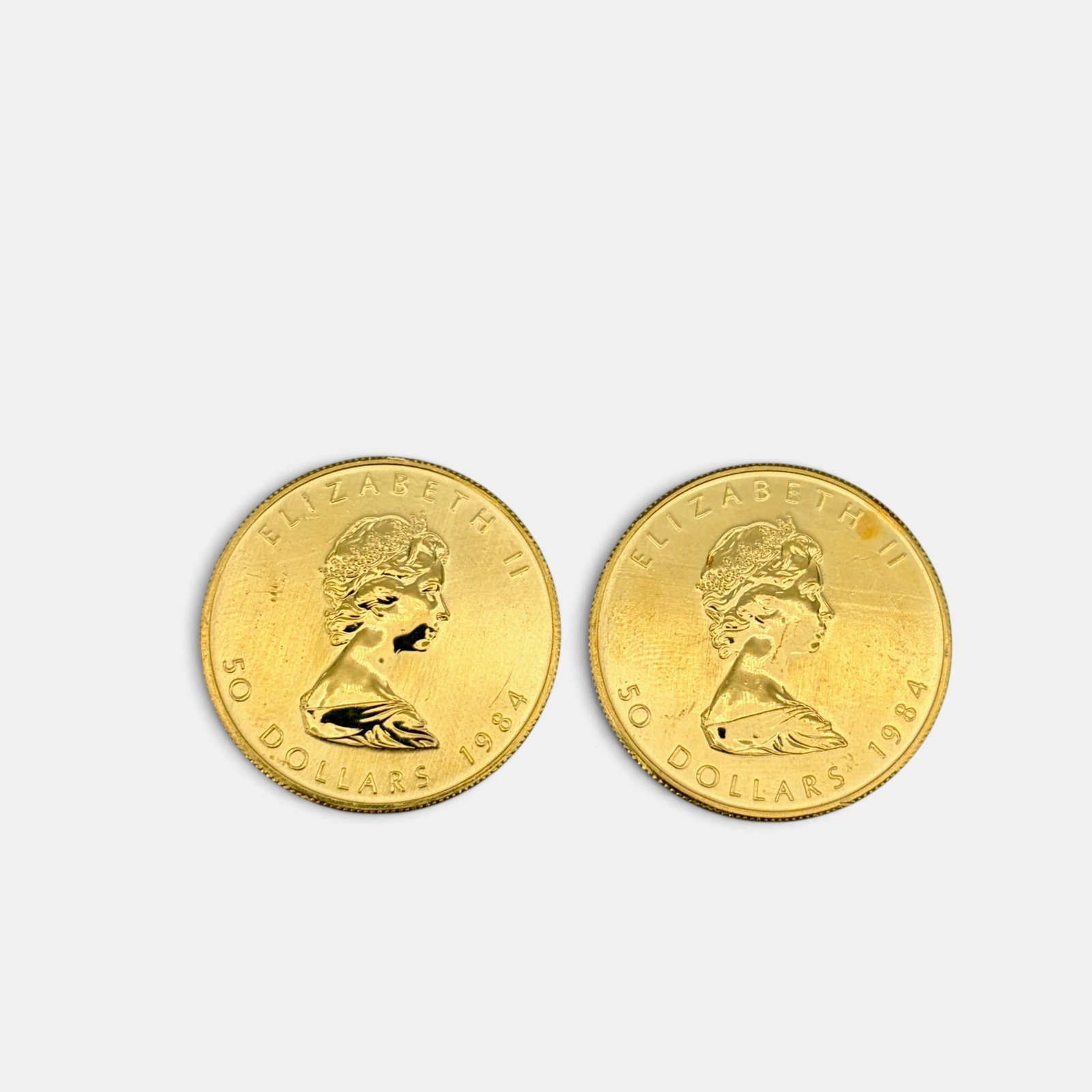 Two Canadian One Ounce Fine Gold Coins (1 of 2)