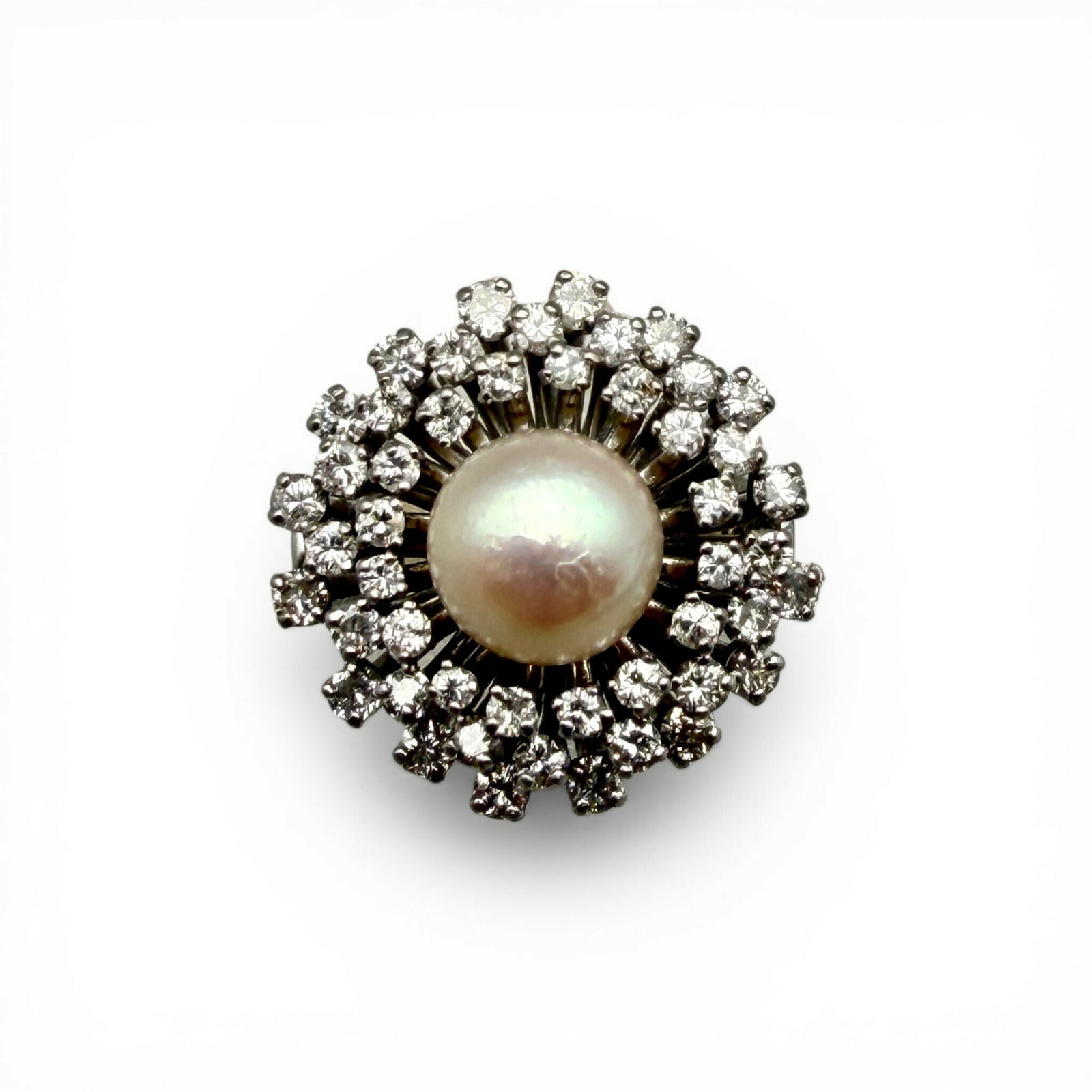 14 kt. Ladies Gold, Pearl and Diamond Ring: 14K white gold ring, with center set saltwater cultured pearl, and three concentric rings of diamonds. 48 total diamonds, with approx. total carat weight of 1.44 ct. Ring size: 6 3/4. Total weight 13.