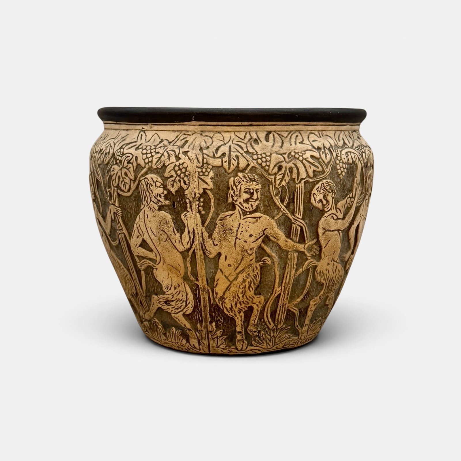 Weller Dechiwo jardiniere, Satyrs: Weller Dechiwo jardiniere with Satyrs dancing around the vase. Impressed Weller in large block letters. Height 8 1/2 inches, diameter 10 5/8 inches.