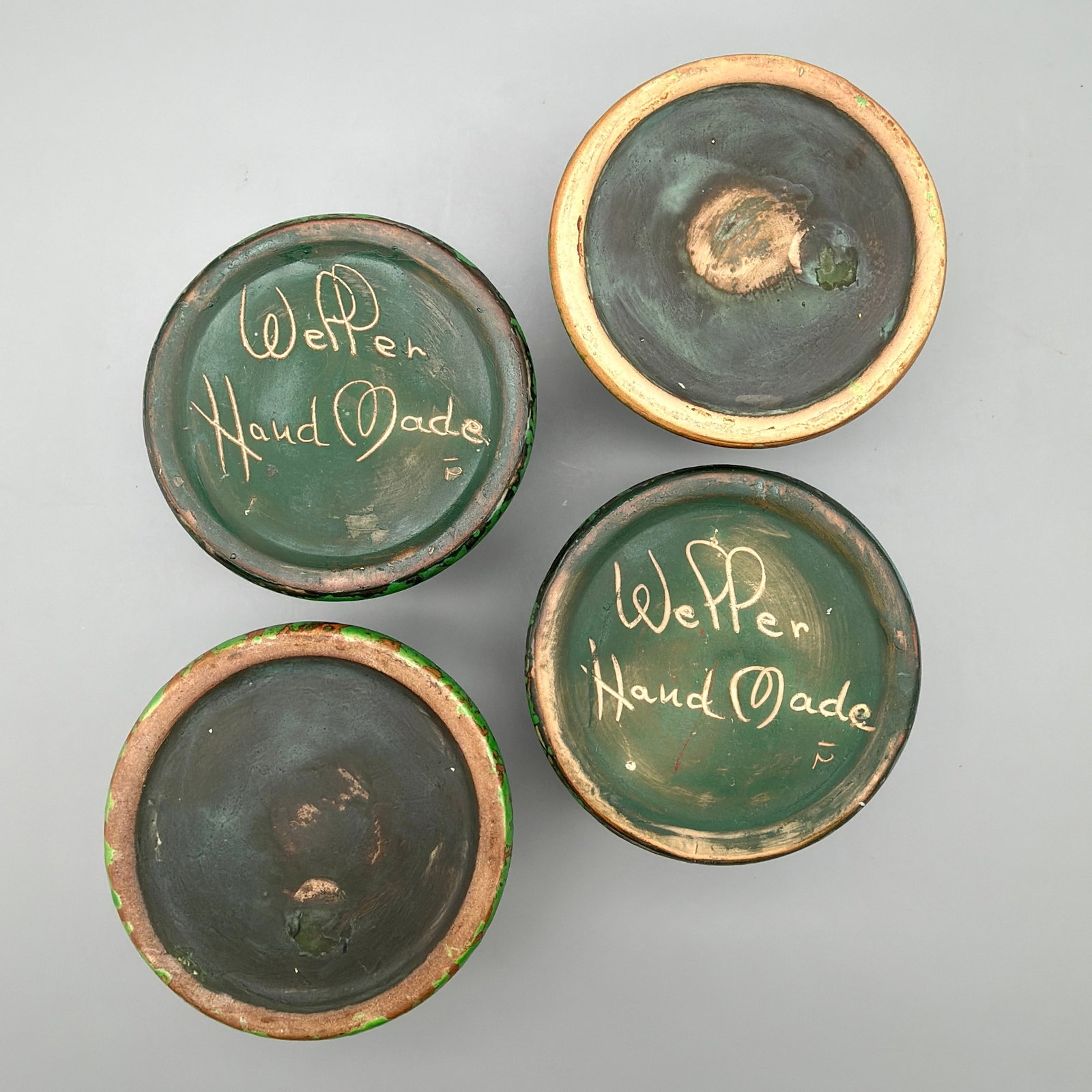 Four Weller Coppertone candlesticks. - 4