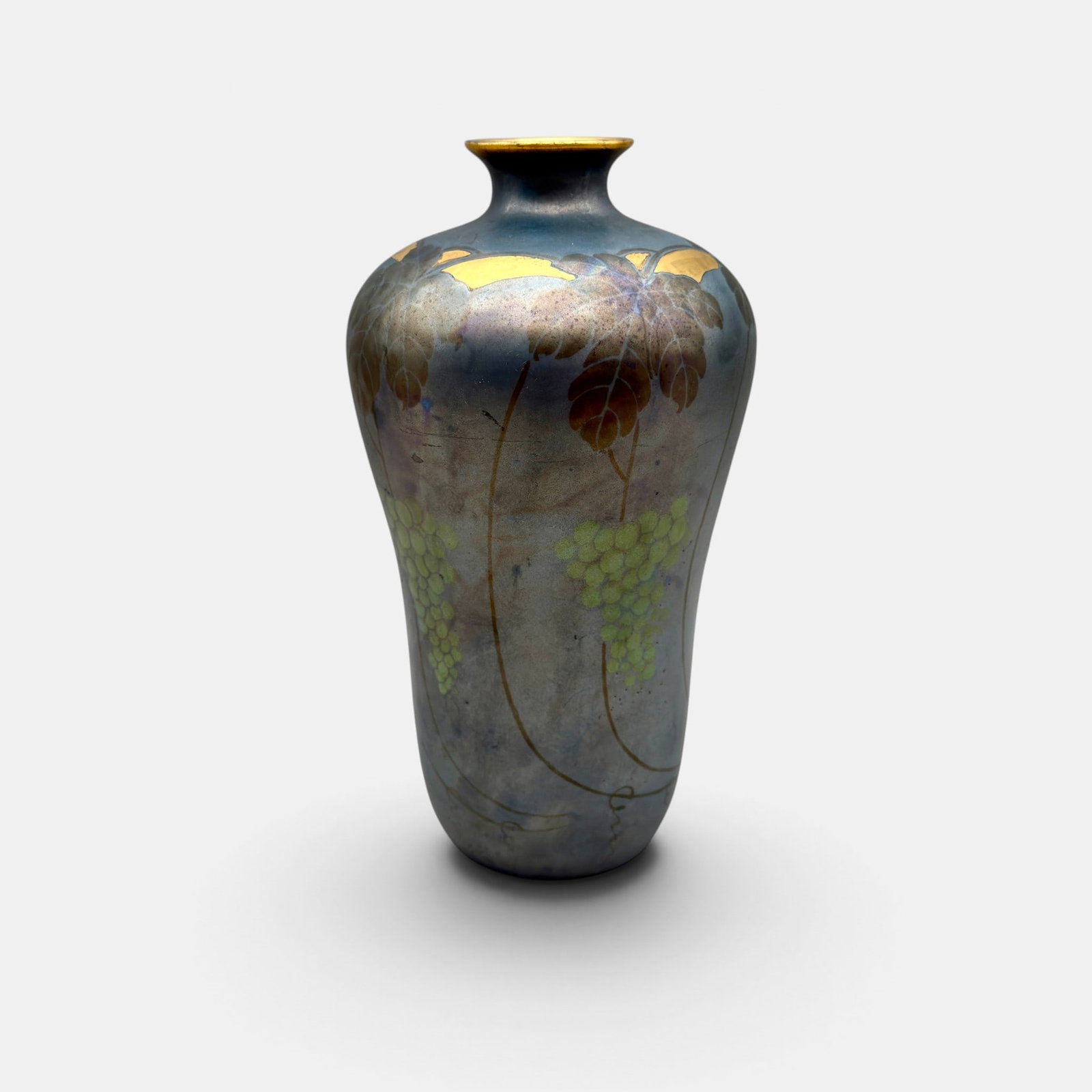 Ernst Wahliss luster ware vase, grapes.: Unusual Ernst Wahliss luster ware vase with fired on gold and clusters of grapes in green. Marked with Ernst Wahliss Vienna logo in red, a gold star and incised numbers 5648. Height 10 inches.