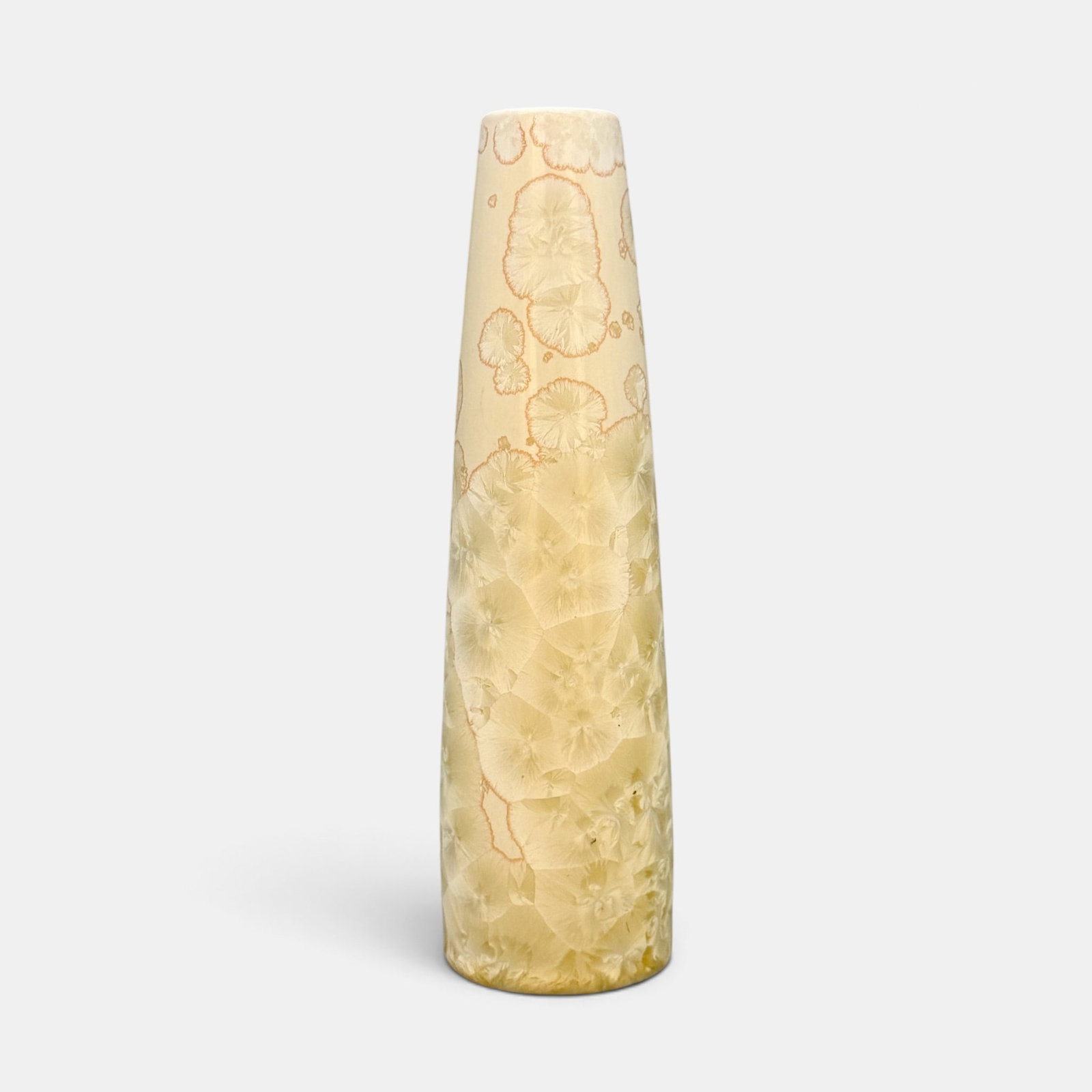 University City vase loaded with white crystals with rose highlights. 1912: Tapering University City vase featuring a profusion of crystals. Incised UC 1912. Painted number 7. Height 7 1/8 inches.