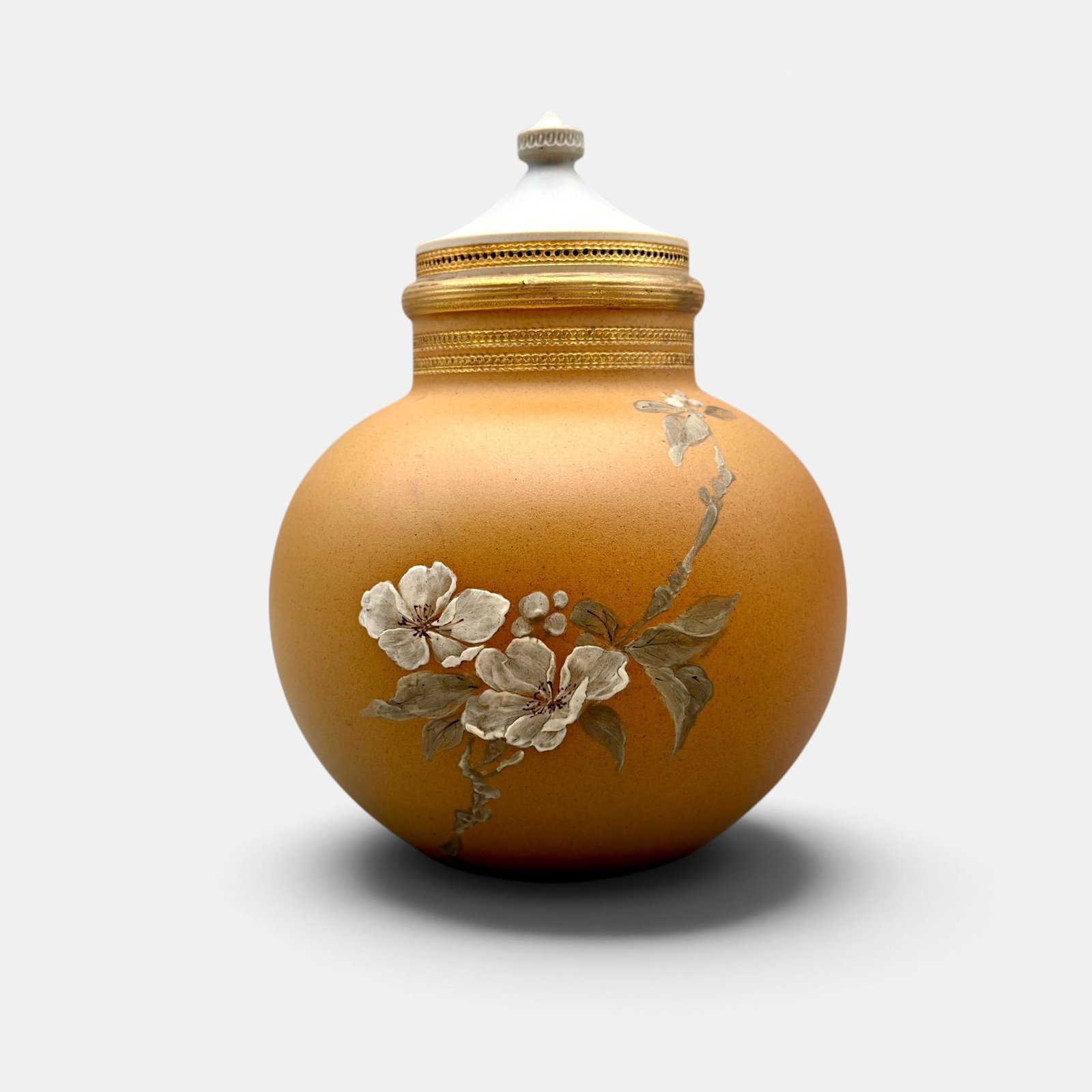 Rookwood Dull Finish scent jar, Anna Valentien, 1887.: Rookwood Dull Finish scent jar with reversible lid, having apple blossom decoration and fired on gold, done in 1887 by Anna (Bookprinter) Valentien. Impressed Rookwood logo with one flame, Shape numbe
