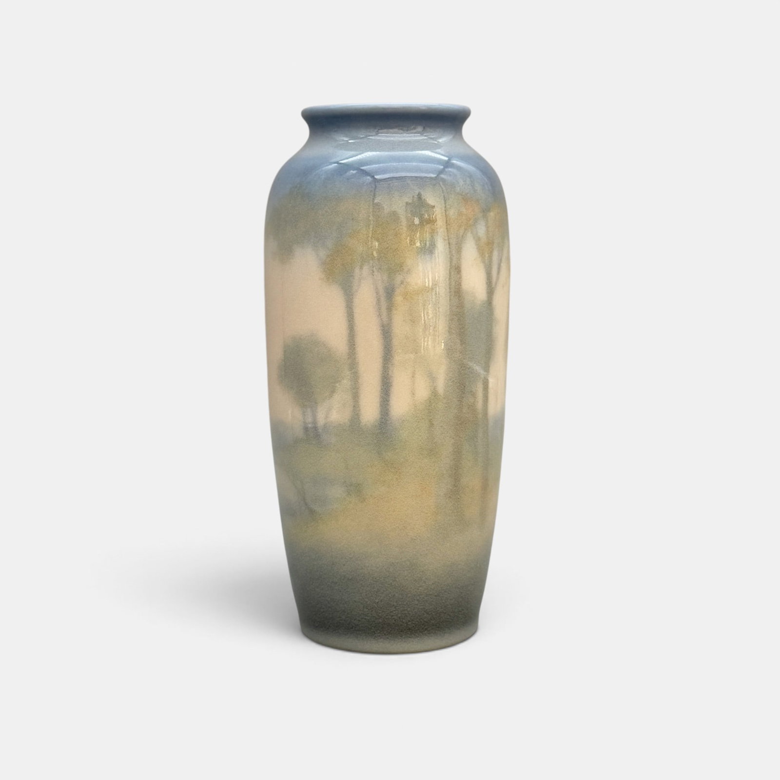 Rookwood Decorated Porcelain scenic vase, E.T. Hurley, 1943: Uusual Decorated Porcelain scenic vase by E.T. Hurley for Rookwood in 1943. The hazy scene features summer trees with a body of water on one side. Impressed Rookwood logo, XLIII, Shape number 904 E. I