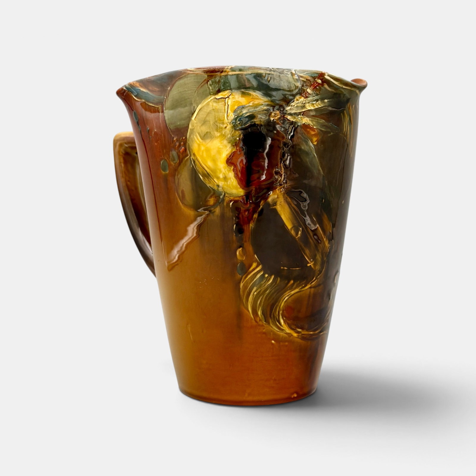 Rookwood Standard glaze pitcher, Native American by Artus Van Briggle, 1889.: Rookwood Standard glaze pitcher documented to be the first Rookwood portrait of a Native American, done by Artus Van Briggle in 1889. The image is of a full moon silhouetting a male with headdress and