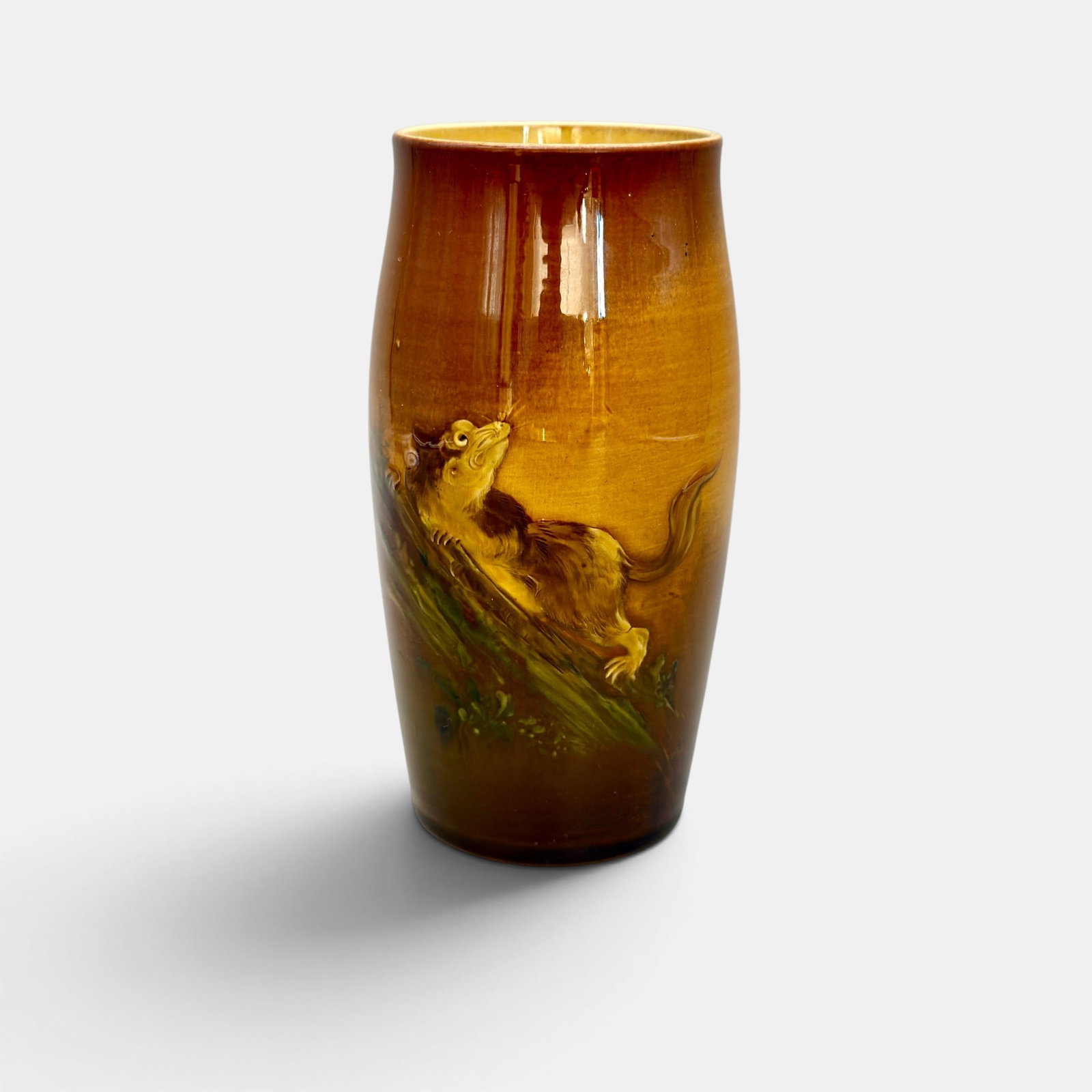 Rookwood Standard glaze mug, Possum, ARV.: Unusual Rookwood Standard glaze mug showing an inquisitive possum climbing up a branch, the work of Albert Valentien in 1888. Impressed Rookwood logo with 2 flames, Shape number 423. Incised ARV/L for