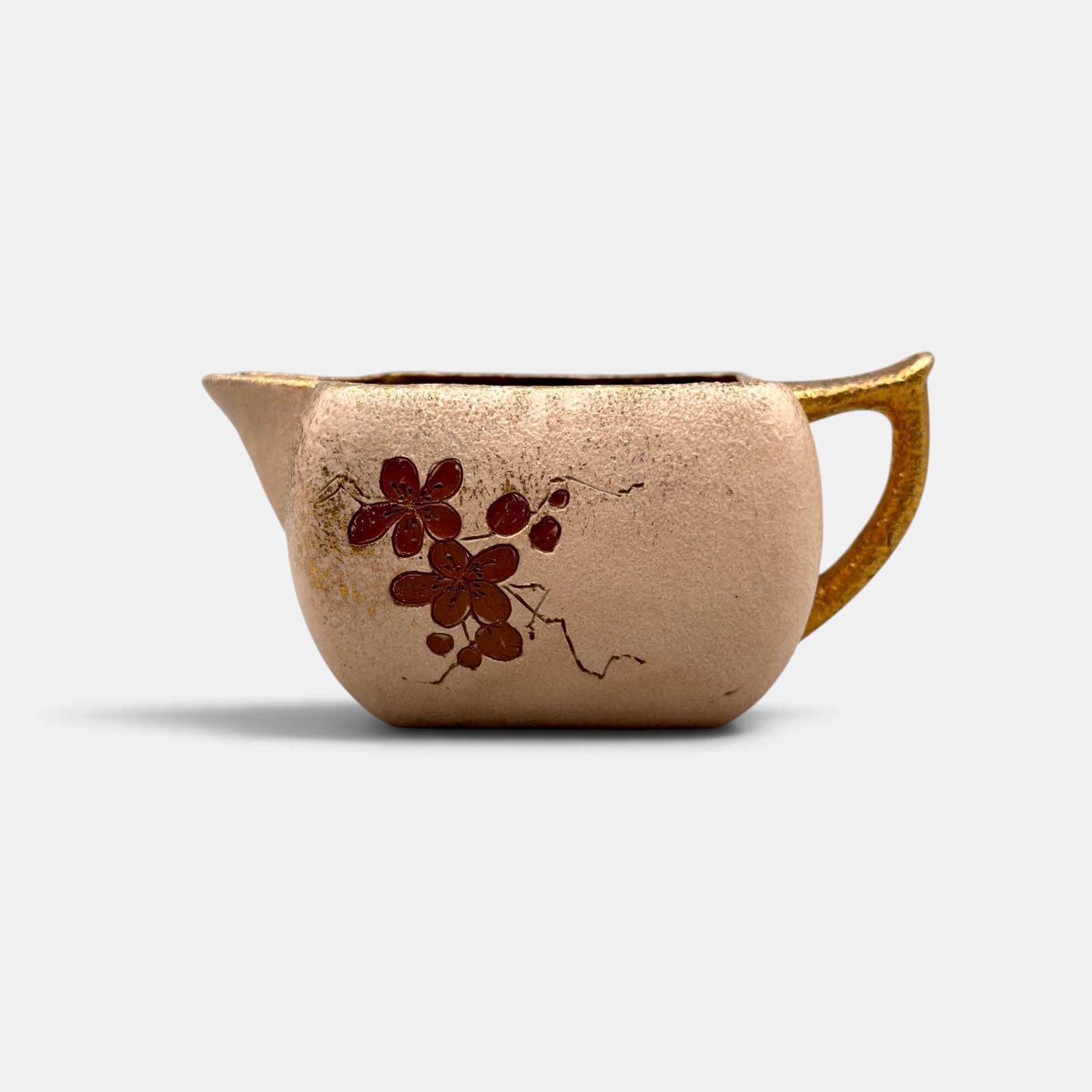 Rookwood Dull Finish creamer with carved flowers, AMV, 1886.: Rookwood Dull Finish creamer with small carved flowers and fired on gold done in 1886 by Anna (Bookprinter) Valentien. Impressed Rookwood logo with no flames, Shape number 43, G for Ginger clay. Incis